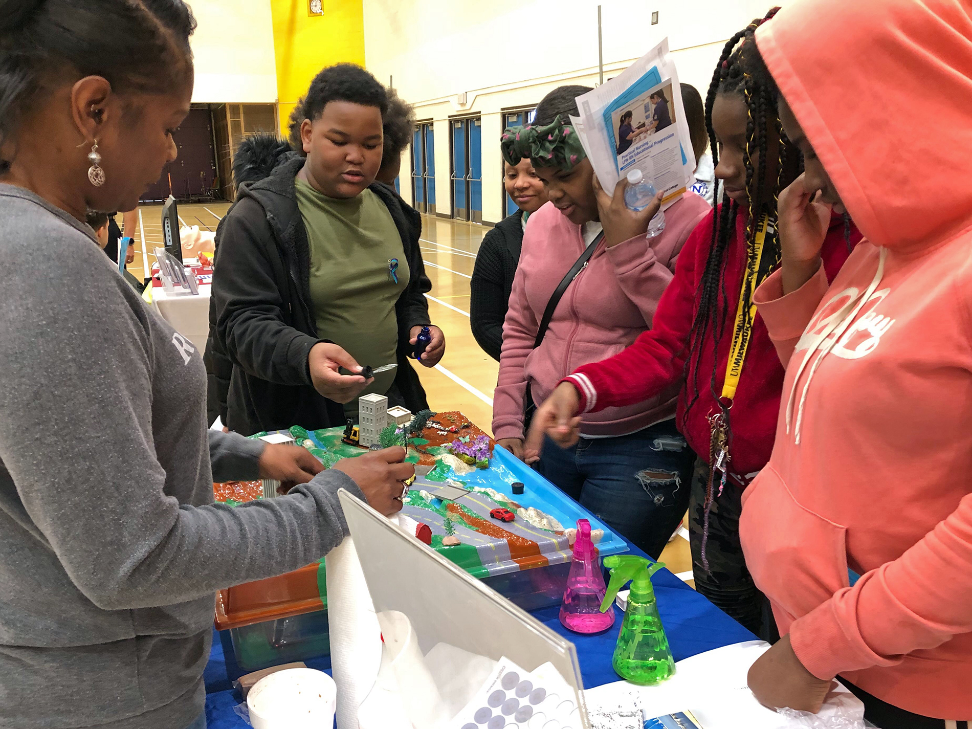 students from Andrew S. Douglas Middle School learn about ways to prevent pollution