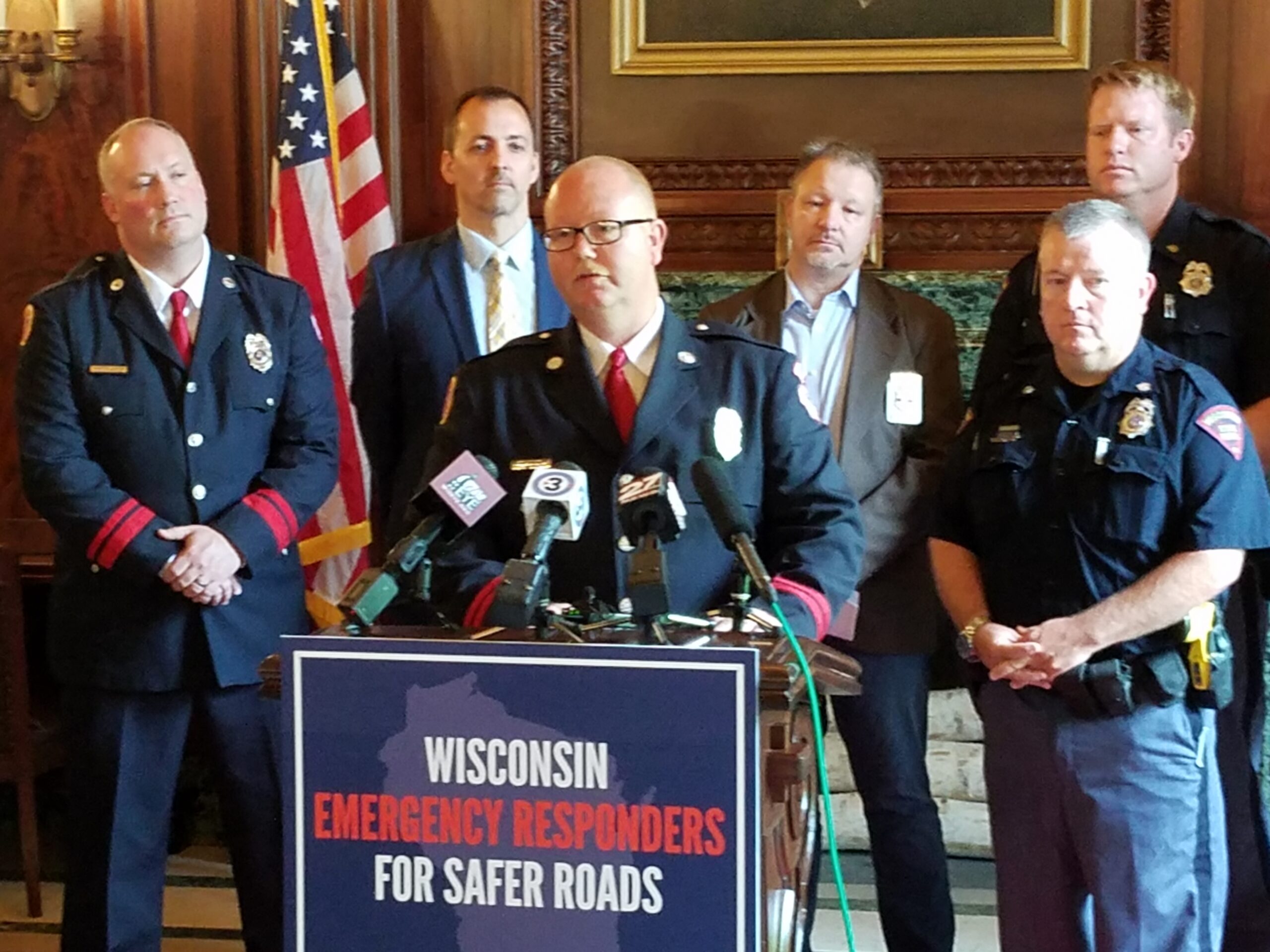 Police officers and firefighters call for a road funding fix.