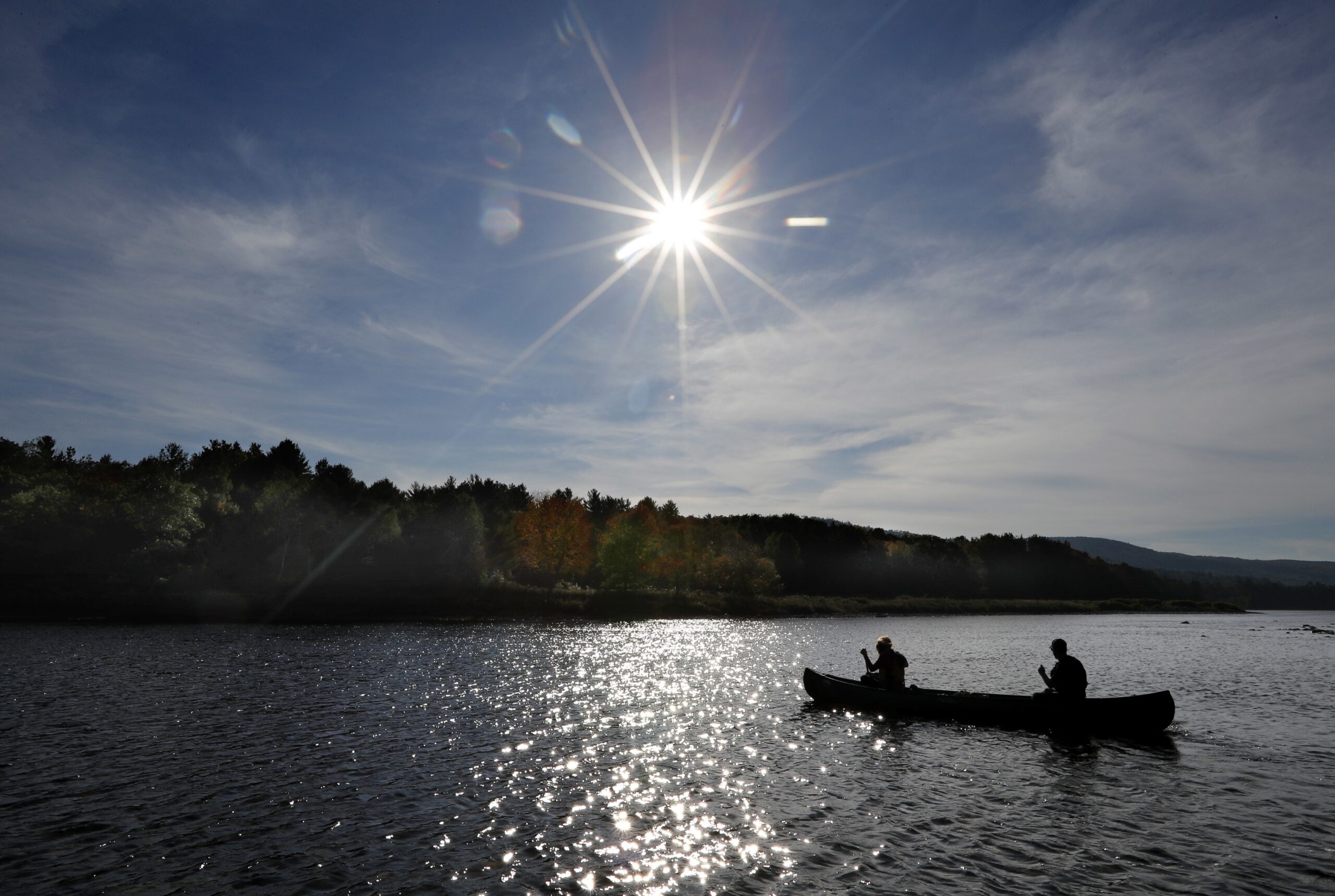 Canoe on lake in fall
