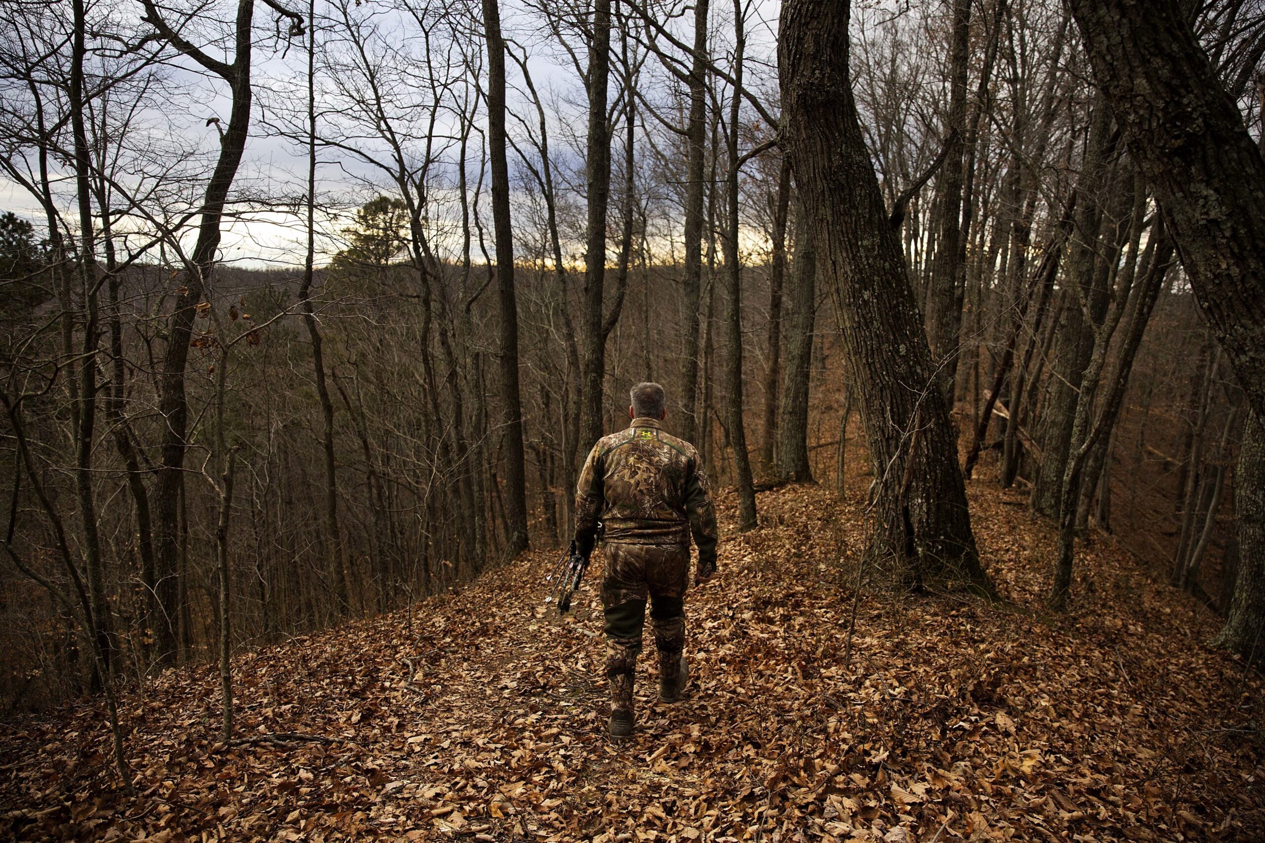 Hunter walking in the woods