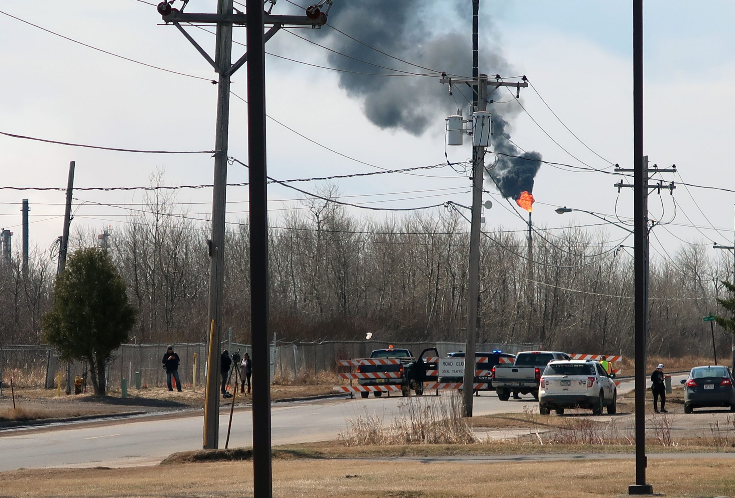 Smoke billows up from Husky Energy refinery