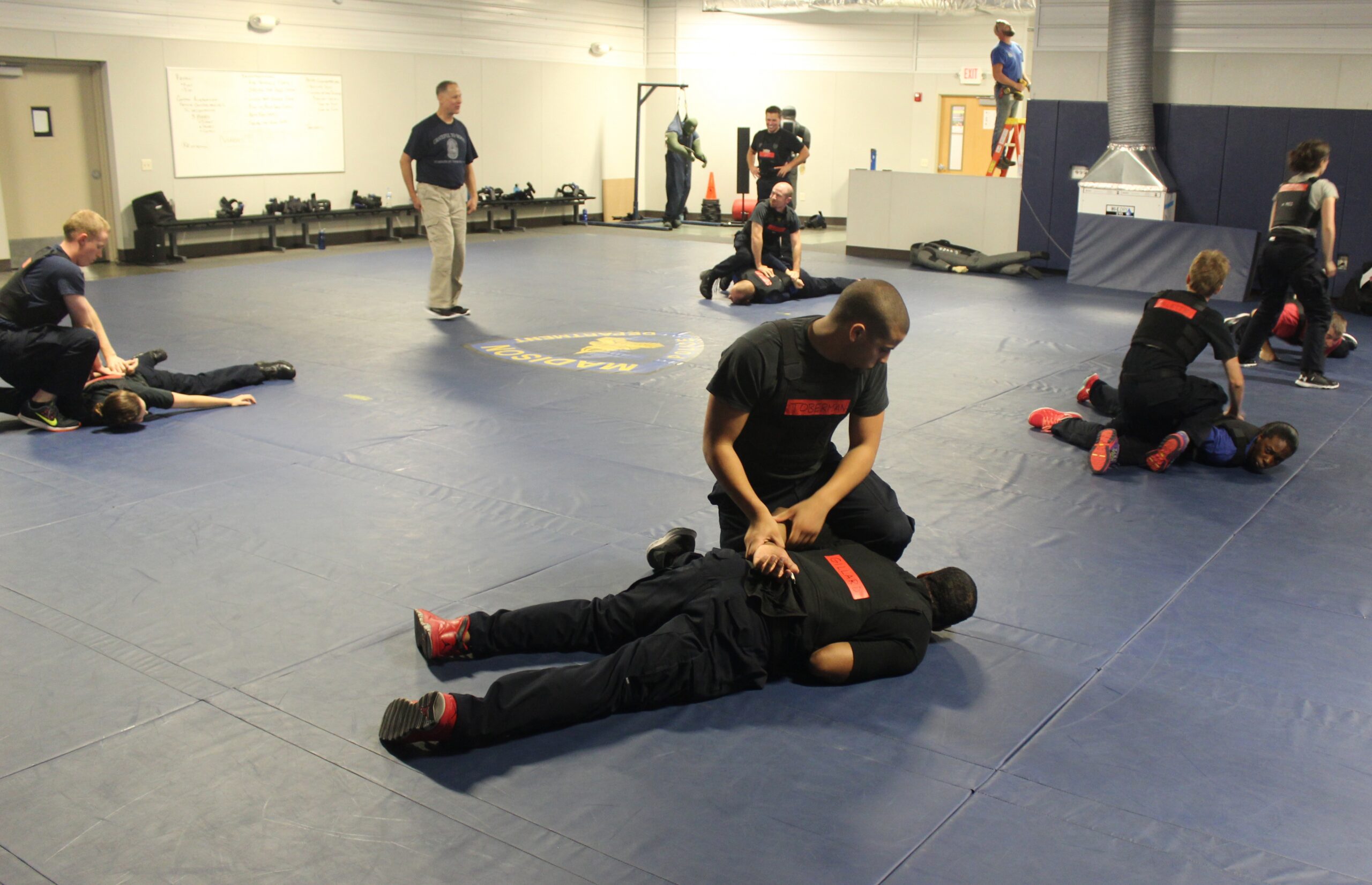 Madison Police recruits practice ground fighting drills at the Madison Police Training Center.