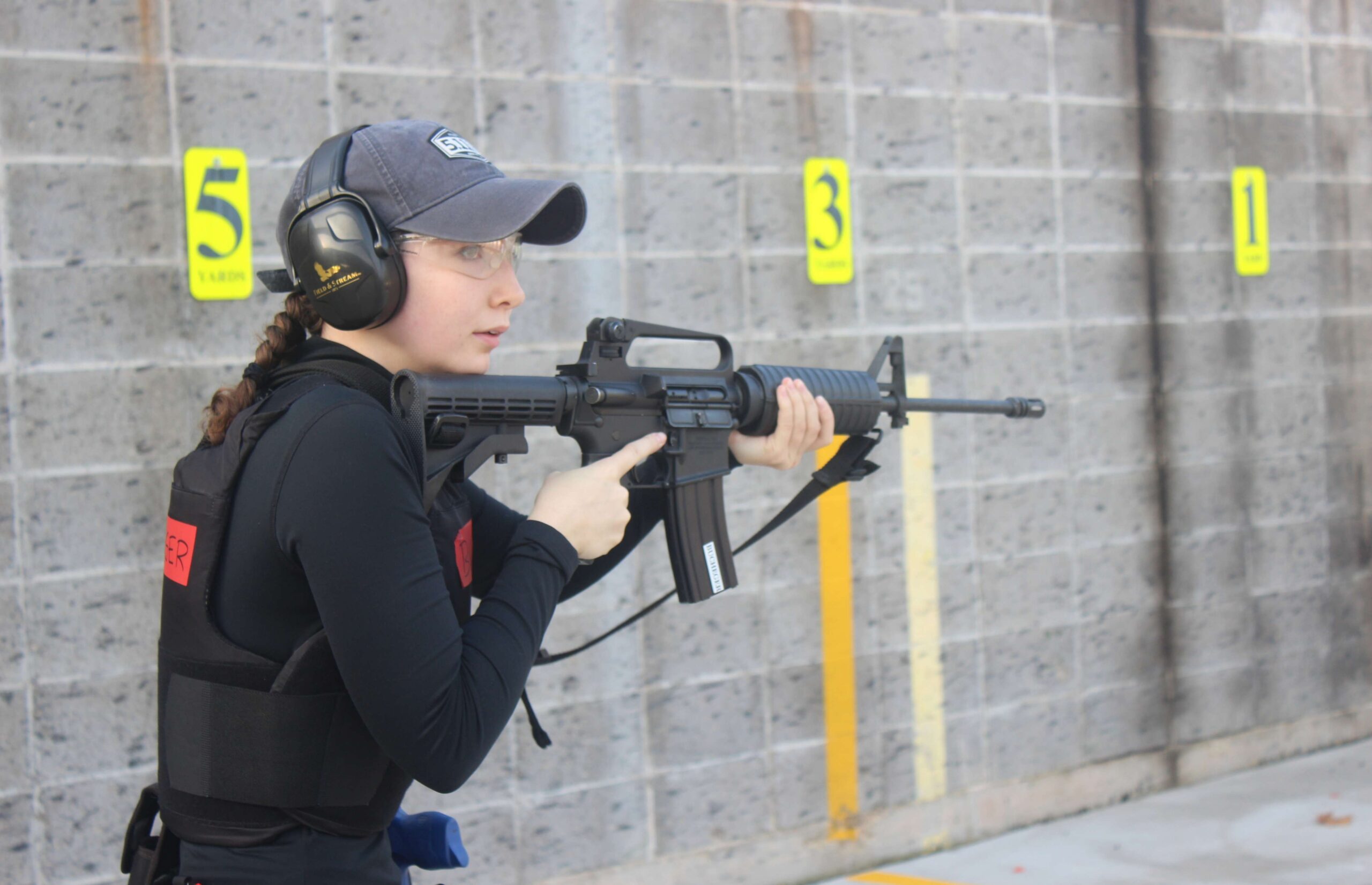 Recruit Lauren Bucheger practices rifle shooting at the Dane County Law Enforcement Training Center shooting range.