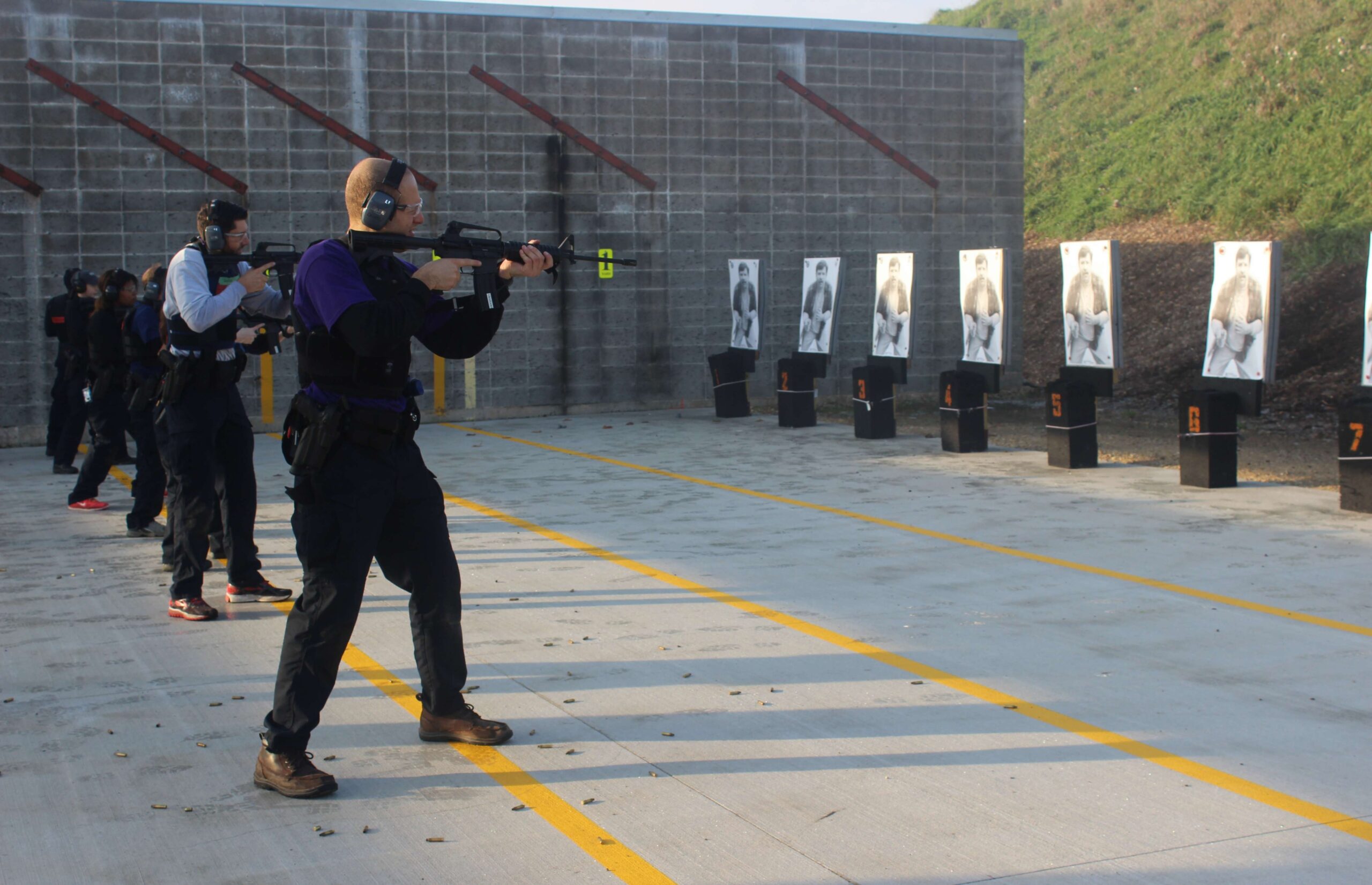 Recruits practice rifle shooting as part of a training exercise.