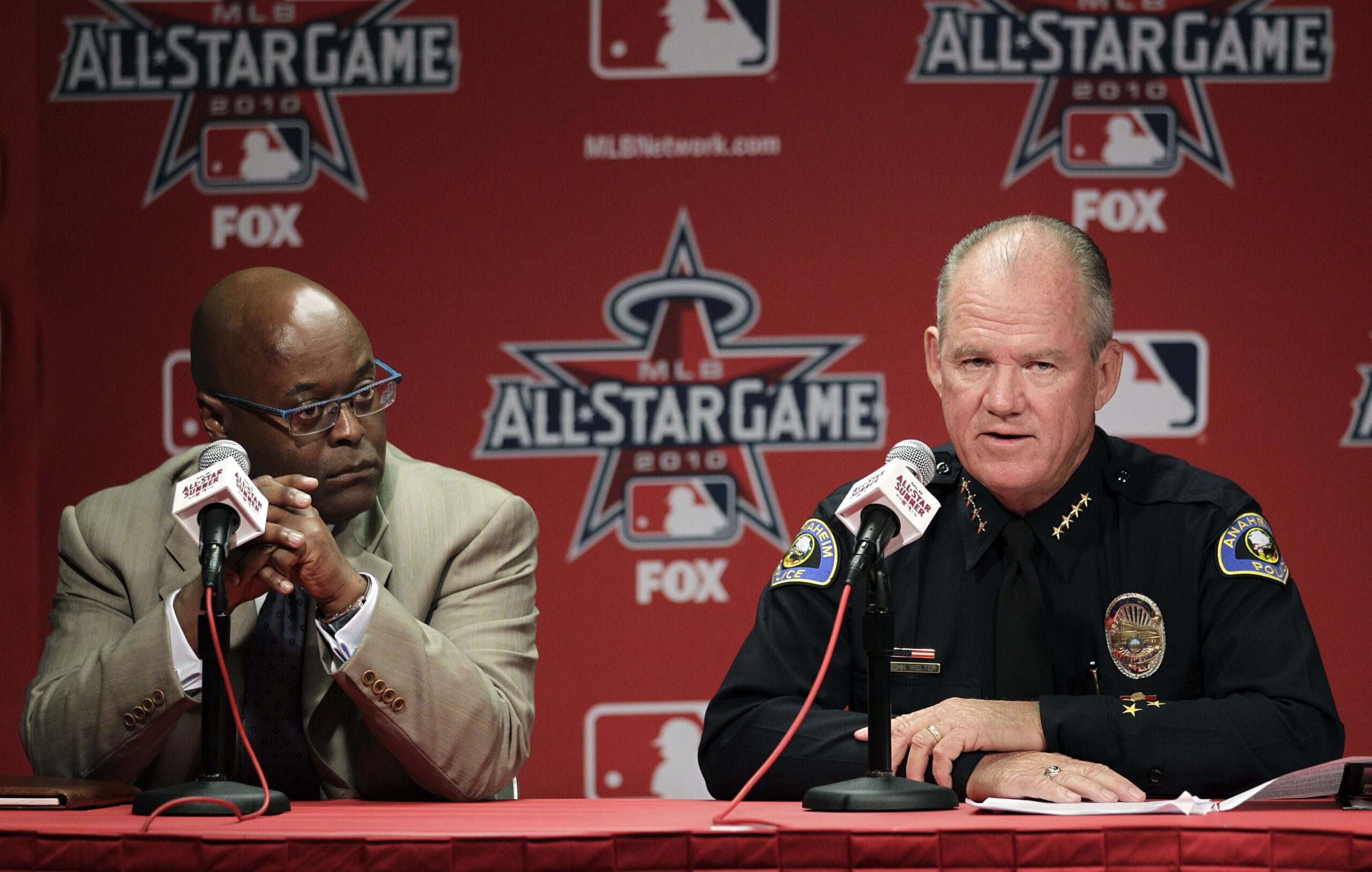 Anaheim Police Chief John Welter, right, joined by Earnell Lucas