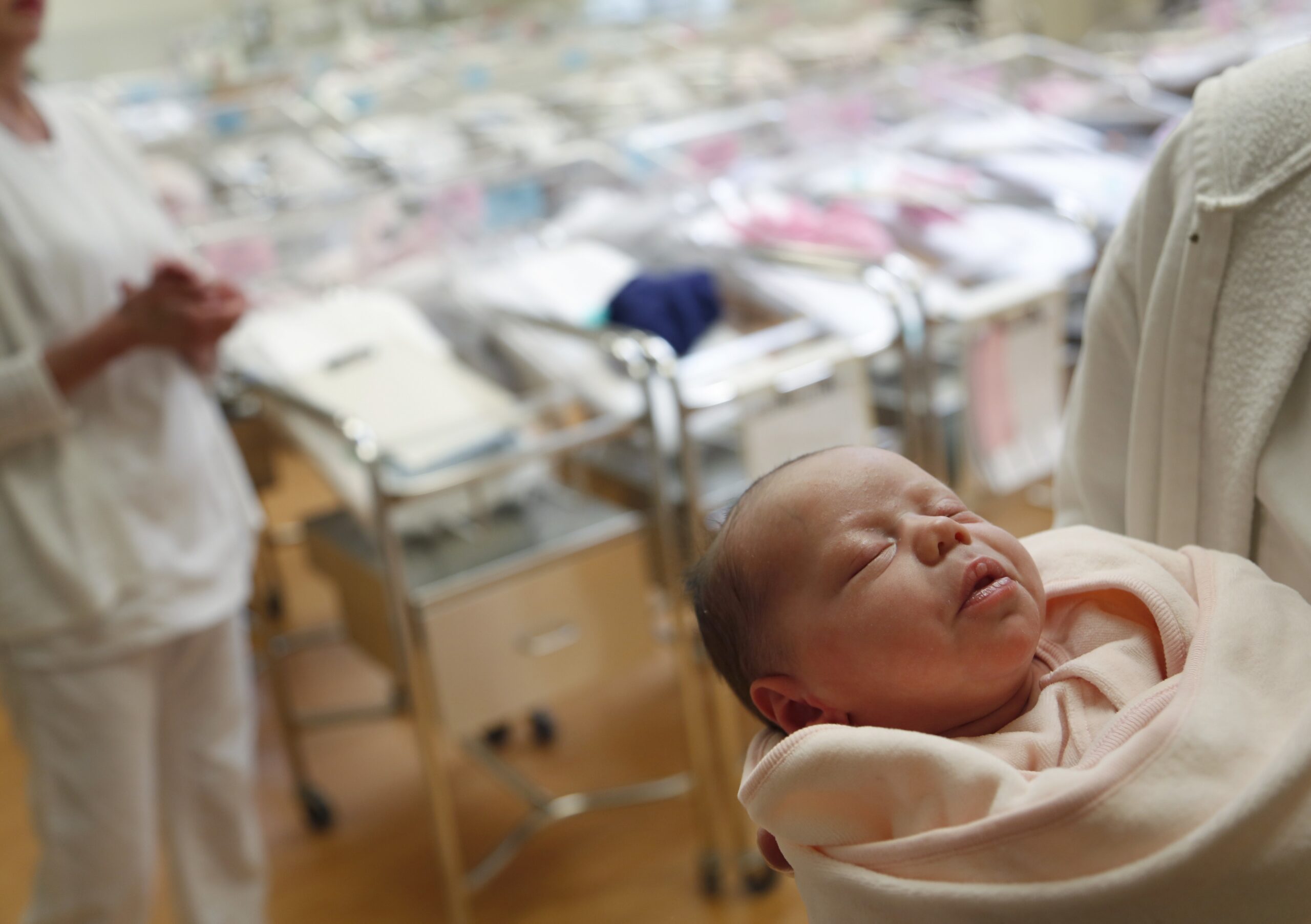 newborn babies in a nursery