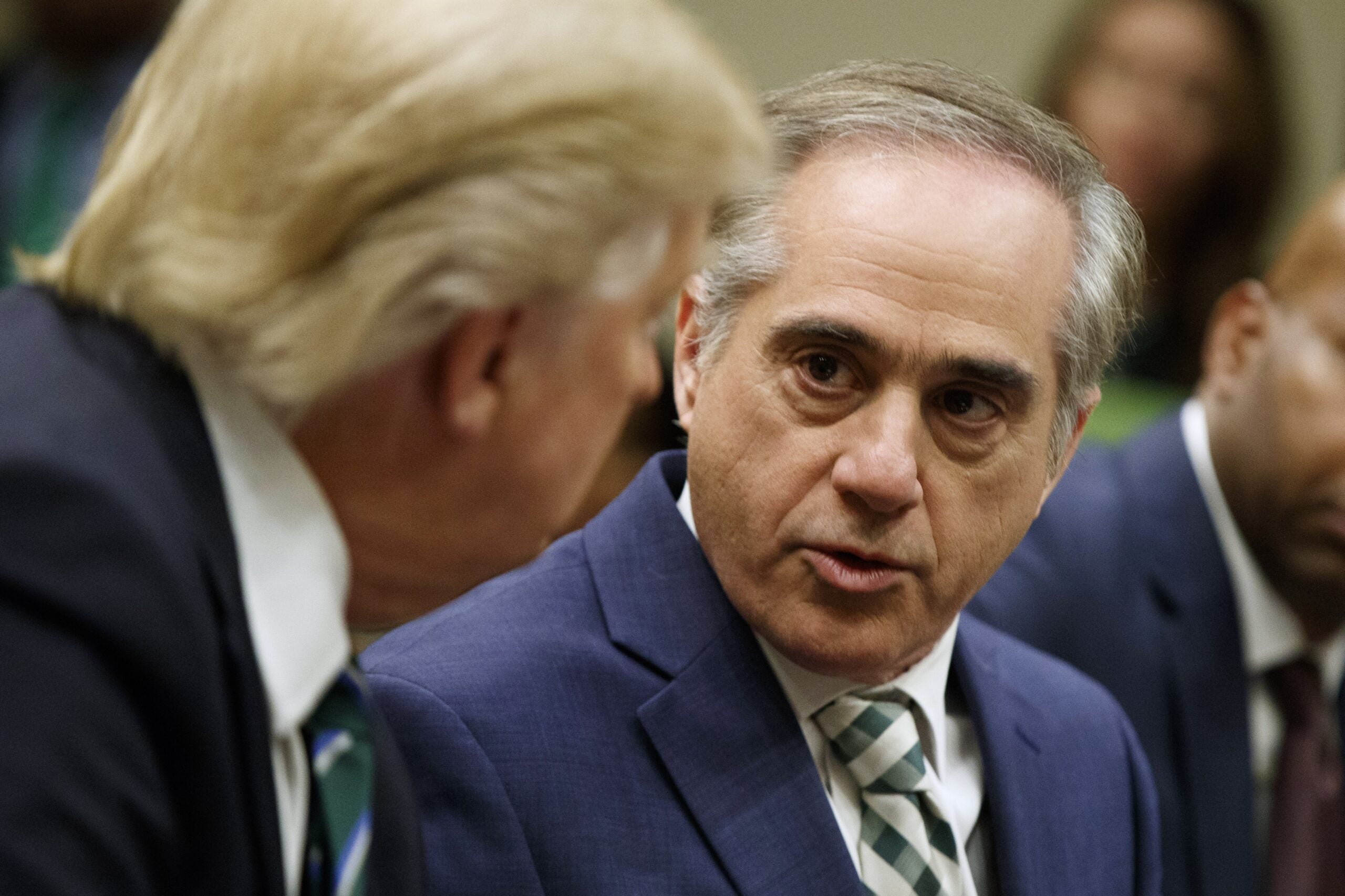 Former Veteran Affairs Secretary David Shulkin speaks to President Donald Trump