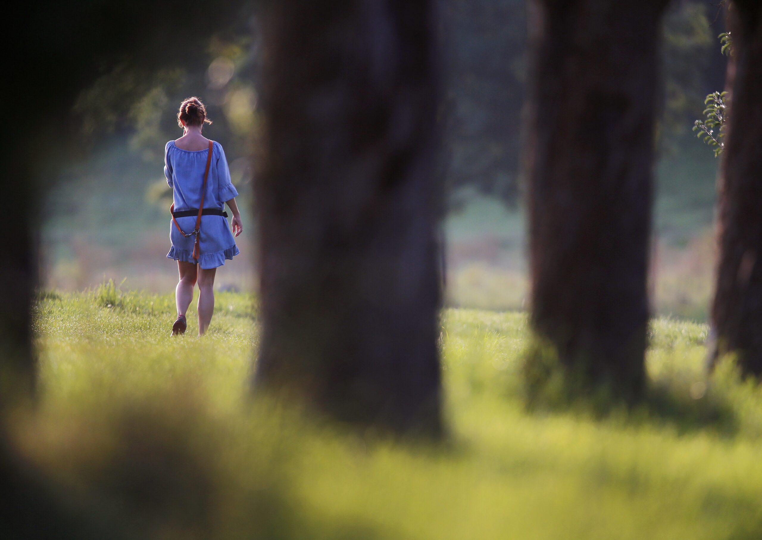 Woman walking in woods
