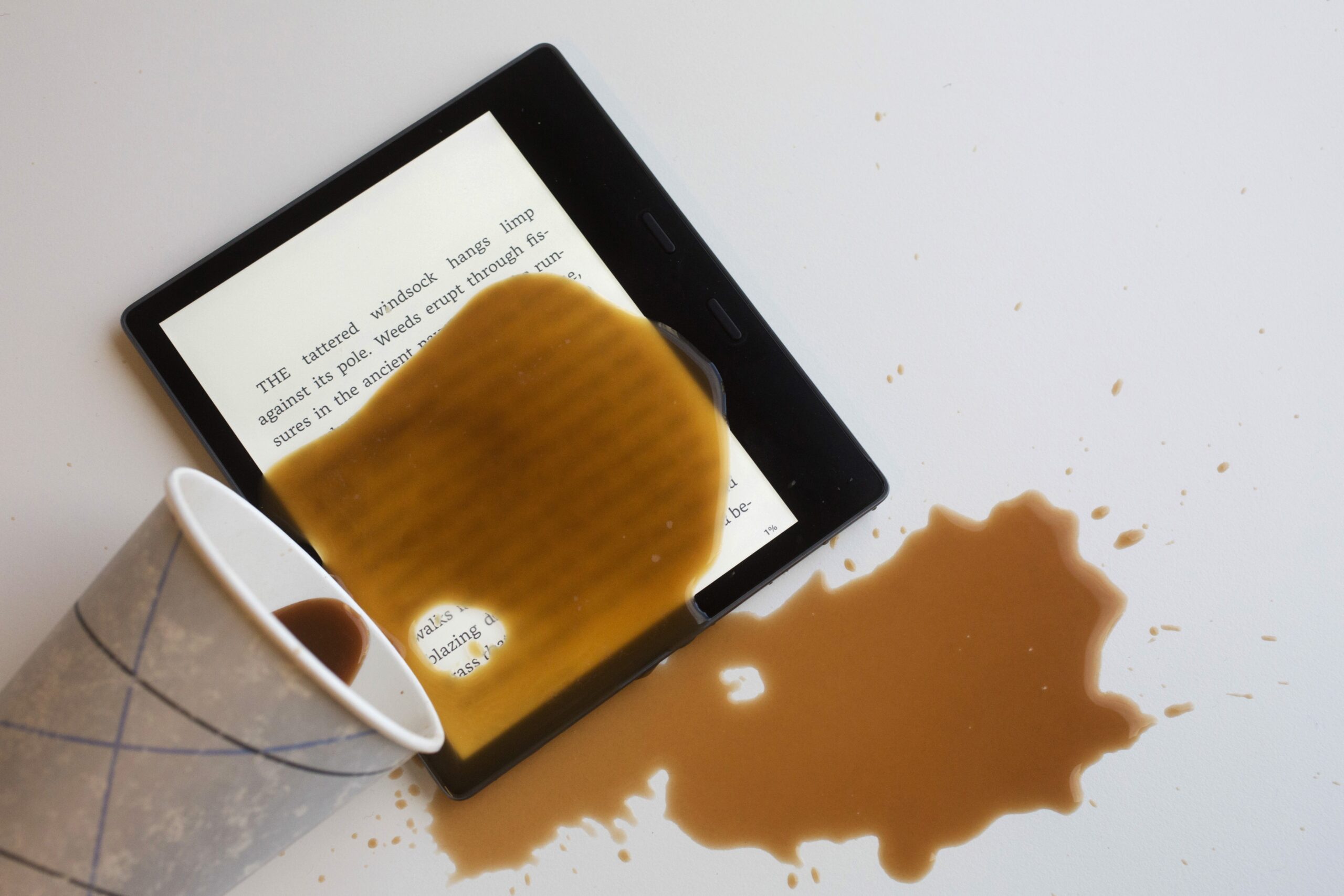 Spilled coffee, e-reader