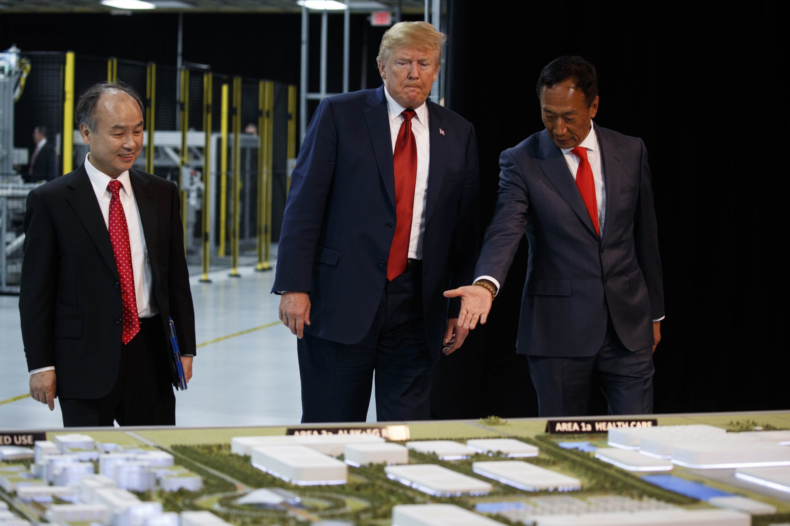 President Donald Trump takes a tour of Foxconn with Foxconn chairman Terry Gou