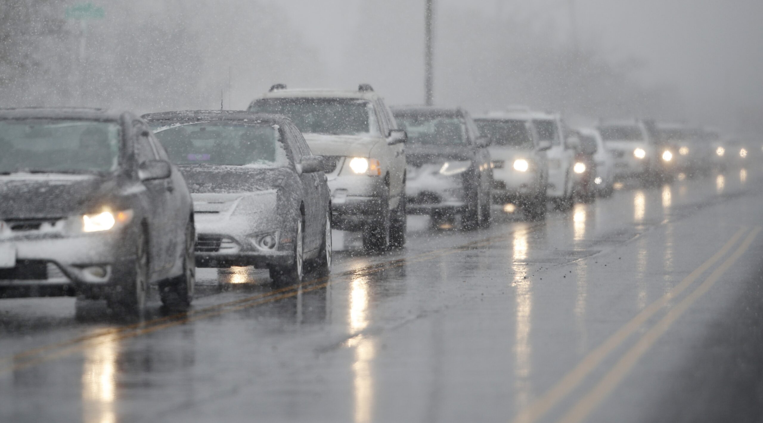Traffic backs up as a spring winter storm rolls in