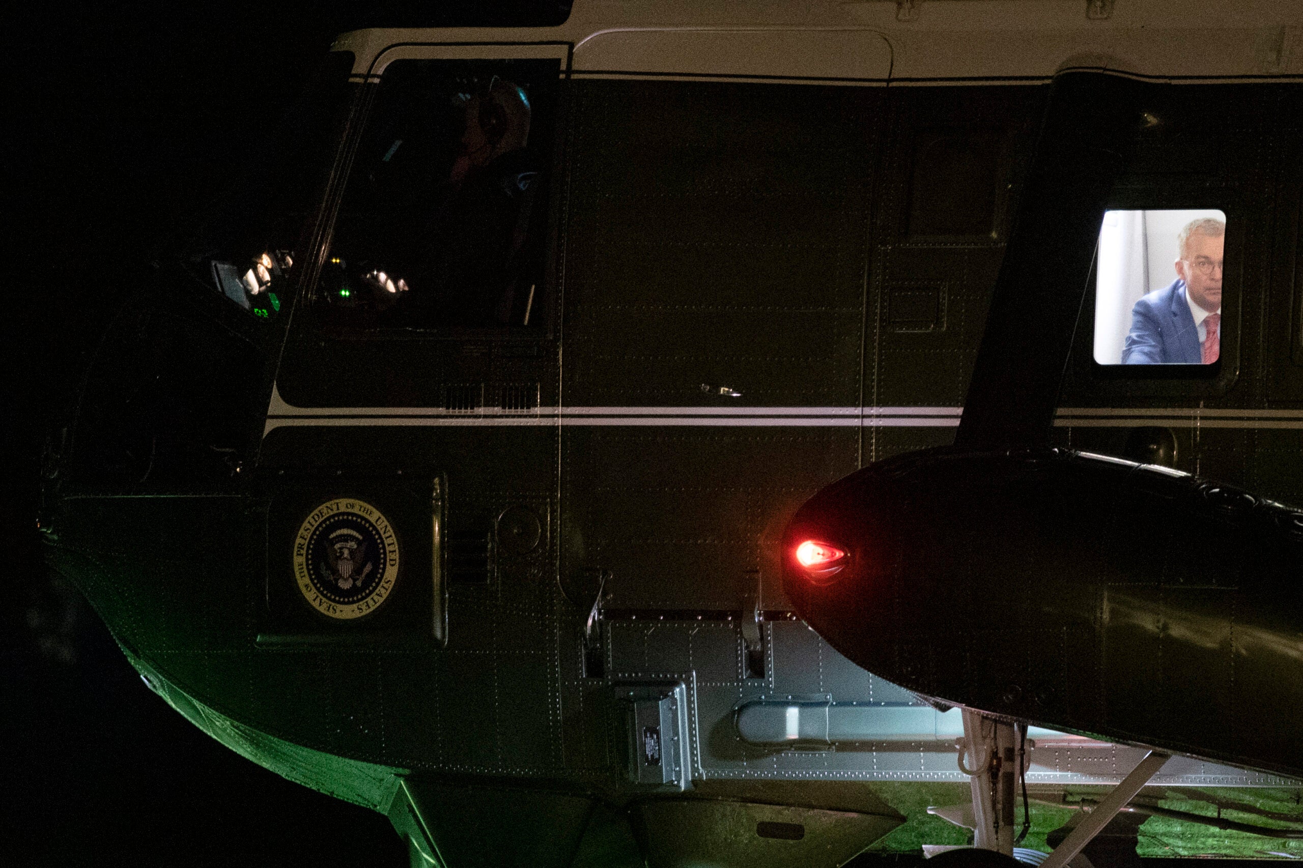 President Donald Trump's Chief of Staff Mick Mulvaney sits inside Marine One