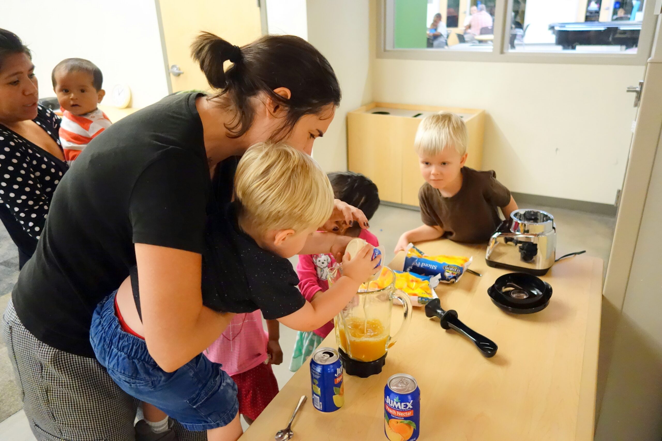 Chef Lily Kilfoy teaching young children to cook at classes held in a local library