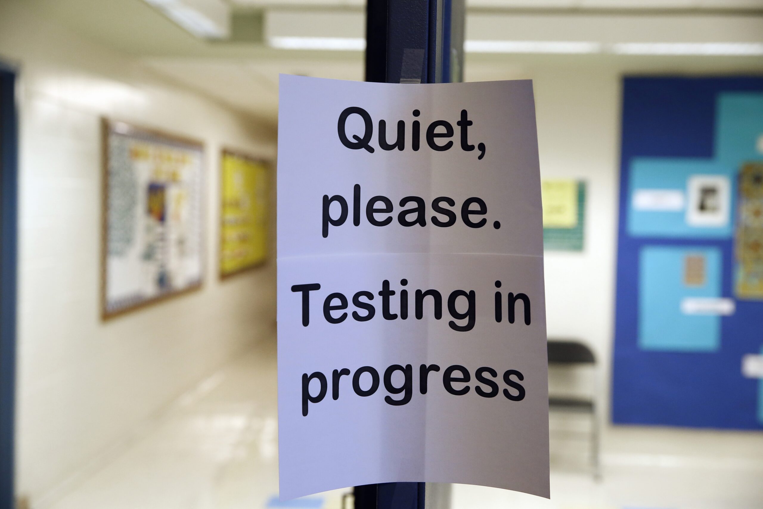 A sign is seen at the entrance to a hall for a college test preparation class in Bethesda, Md.