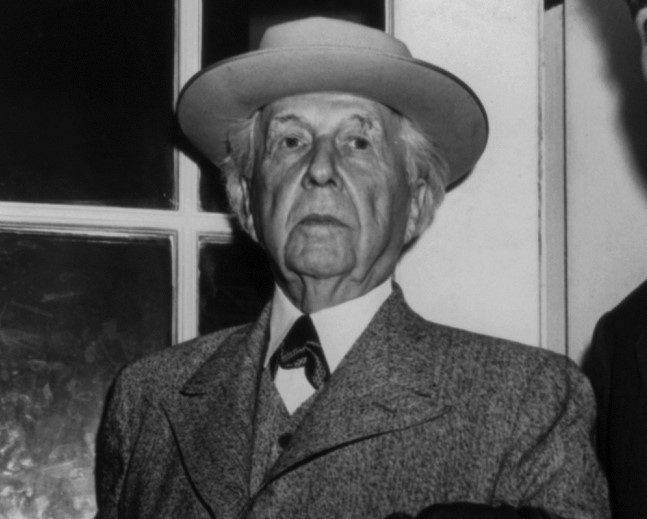 Architect Frank Lloyd Wright at door of the White House