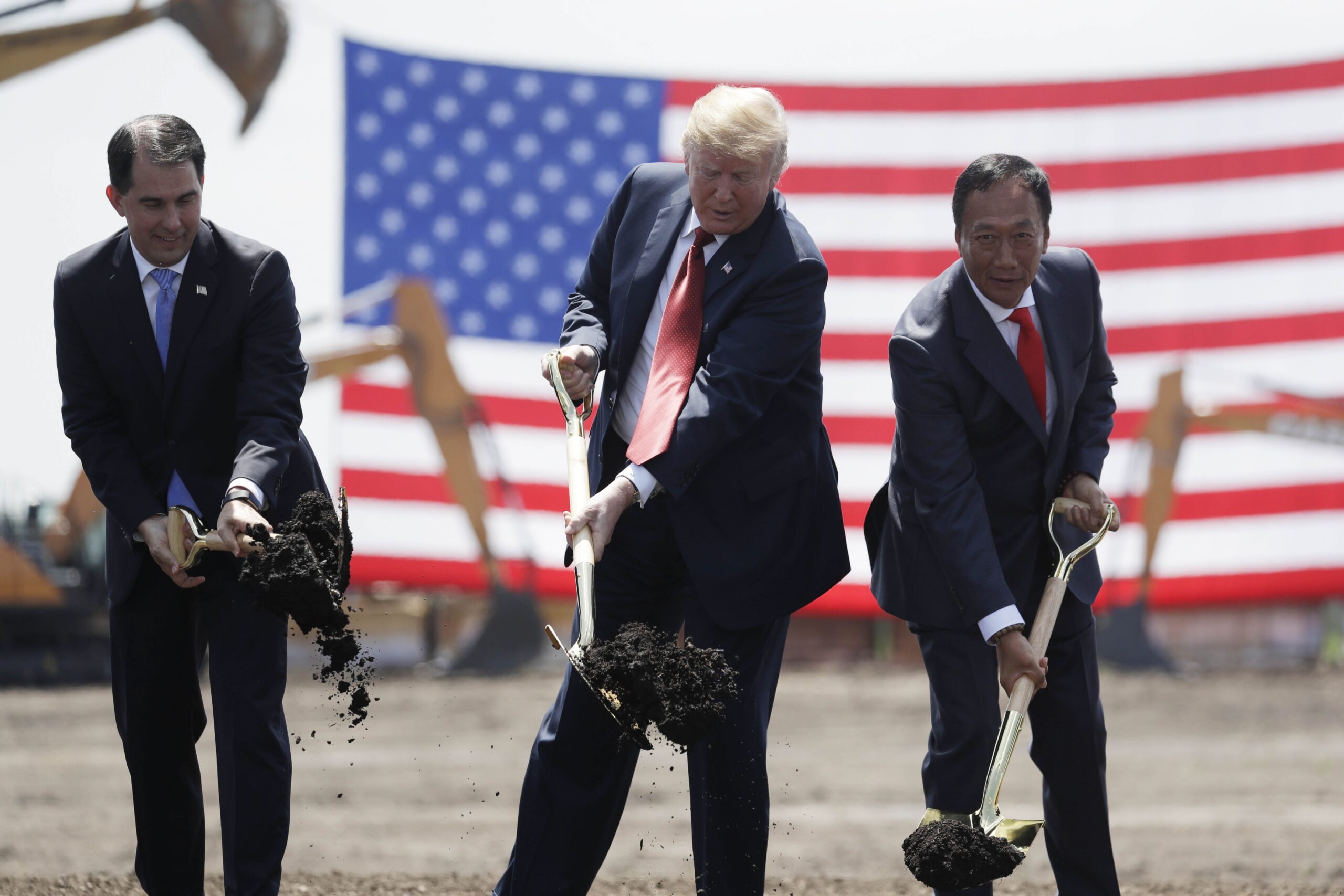 From left to right, Wisconsin Gov. Scott Walker, President Donald Trump and Foxconn Technology Group CEO Terry Gou participate in the groundbreaking ceremony of the Foxconn plant