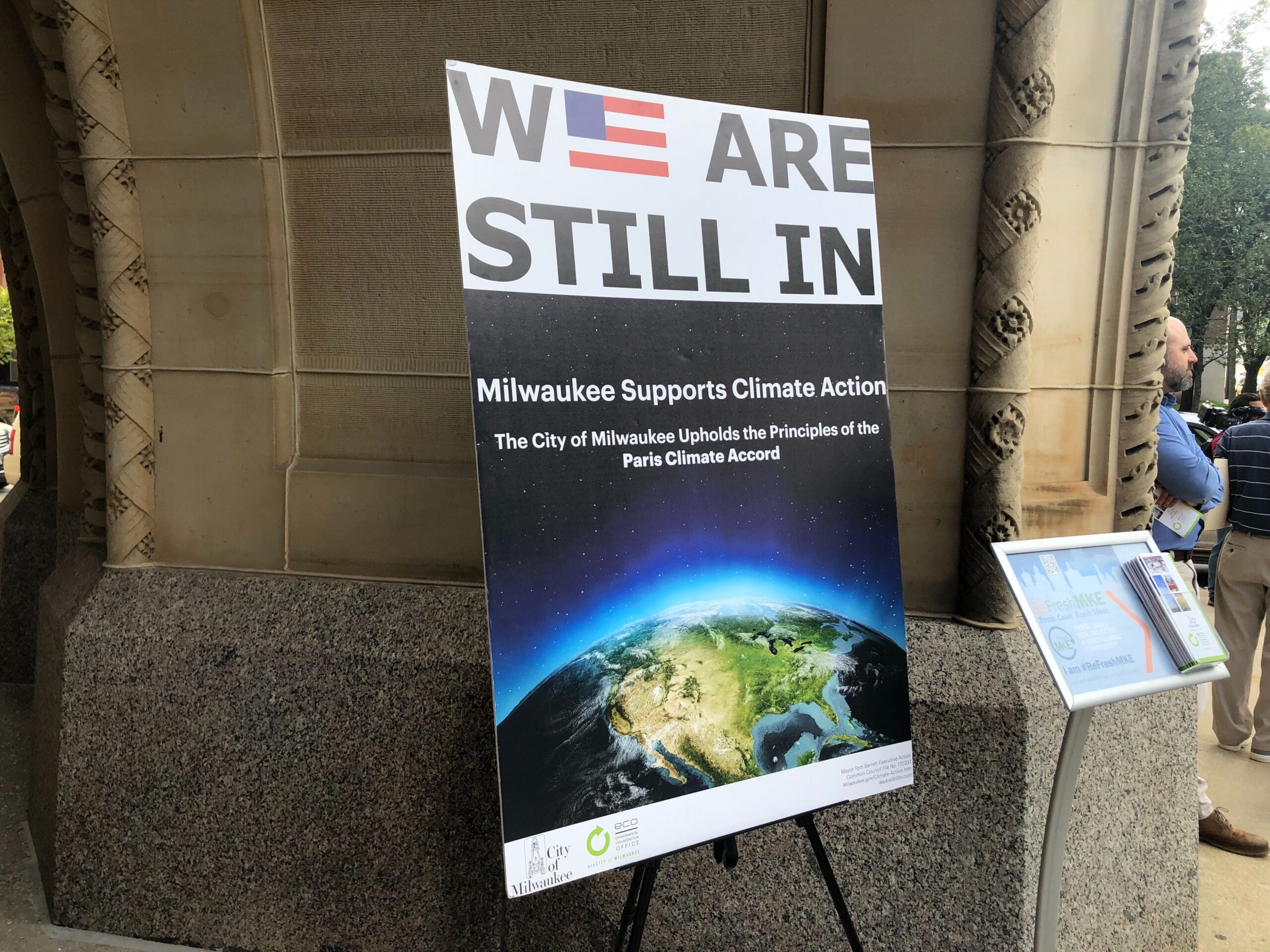 A sign outside Milwaukee City Hall reads, 