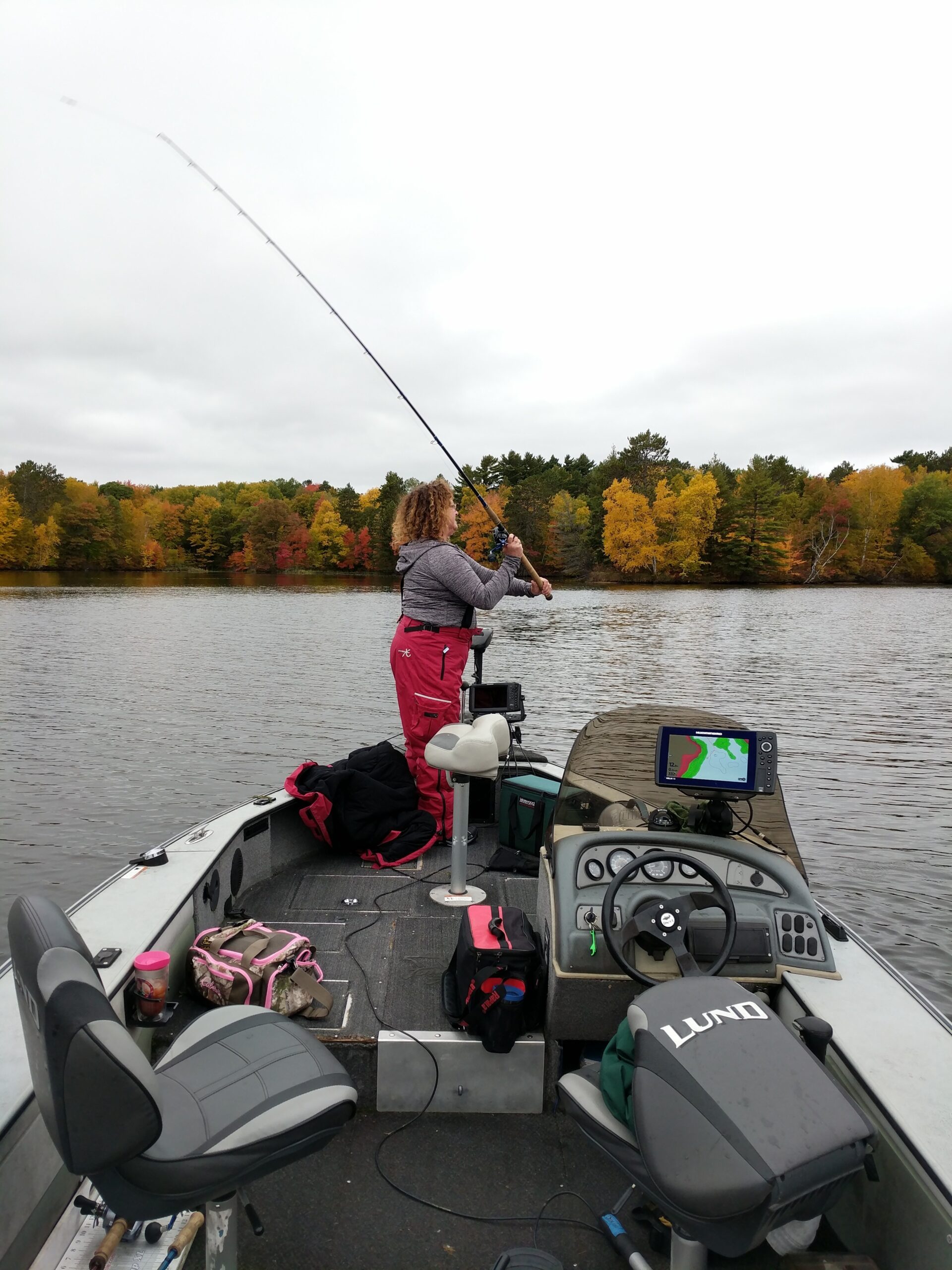Ladies' Musky Fishing School participant casts her reel