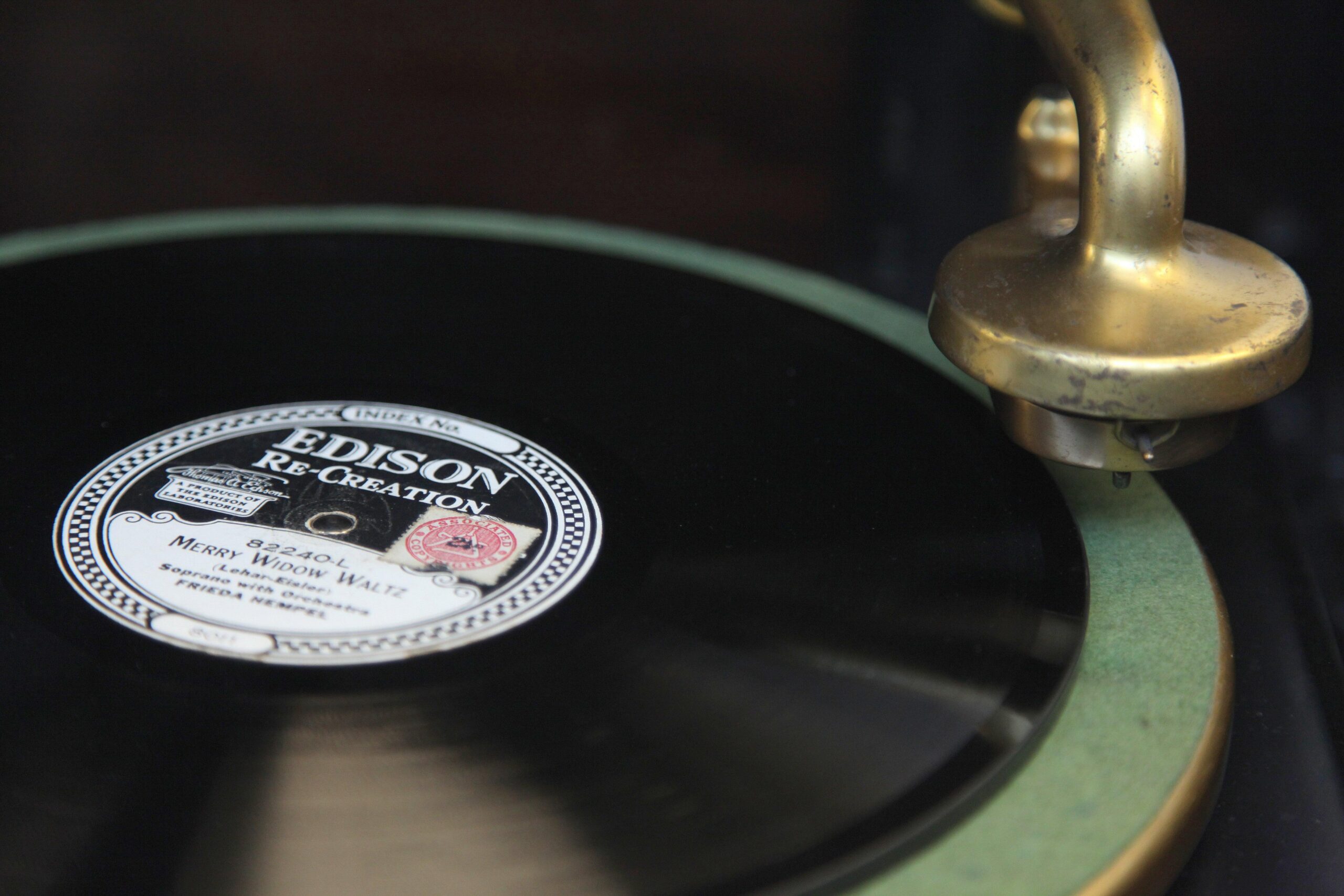 A vintage record player poised for the needle to drop