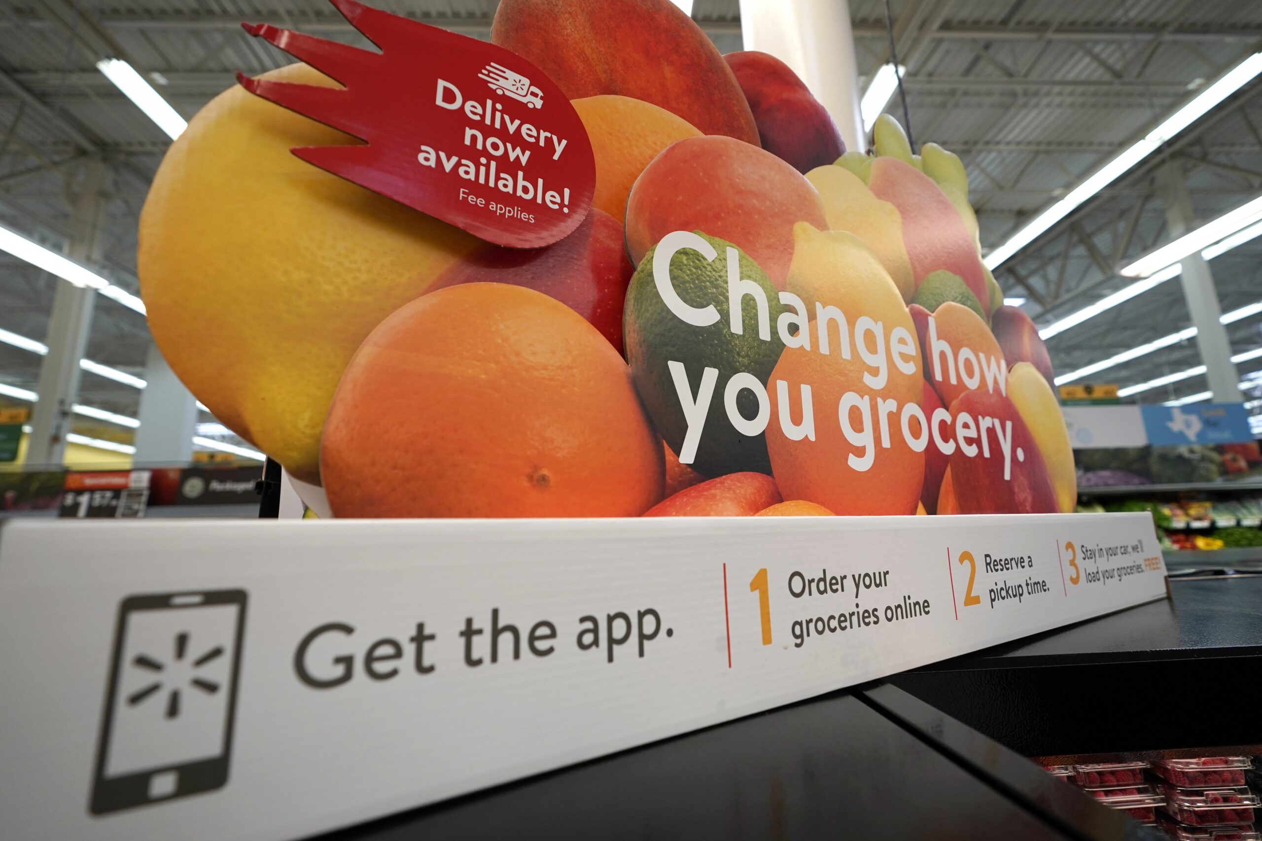 Walmart promotional sign for online grocery service