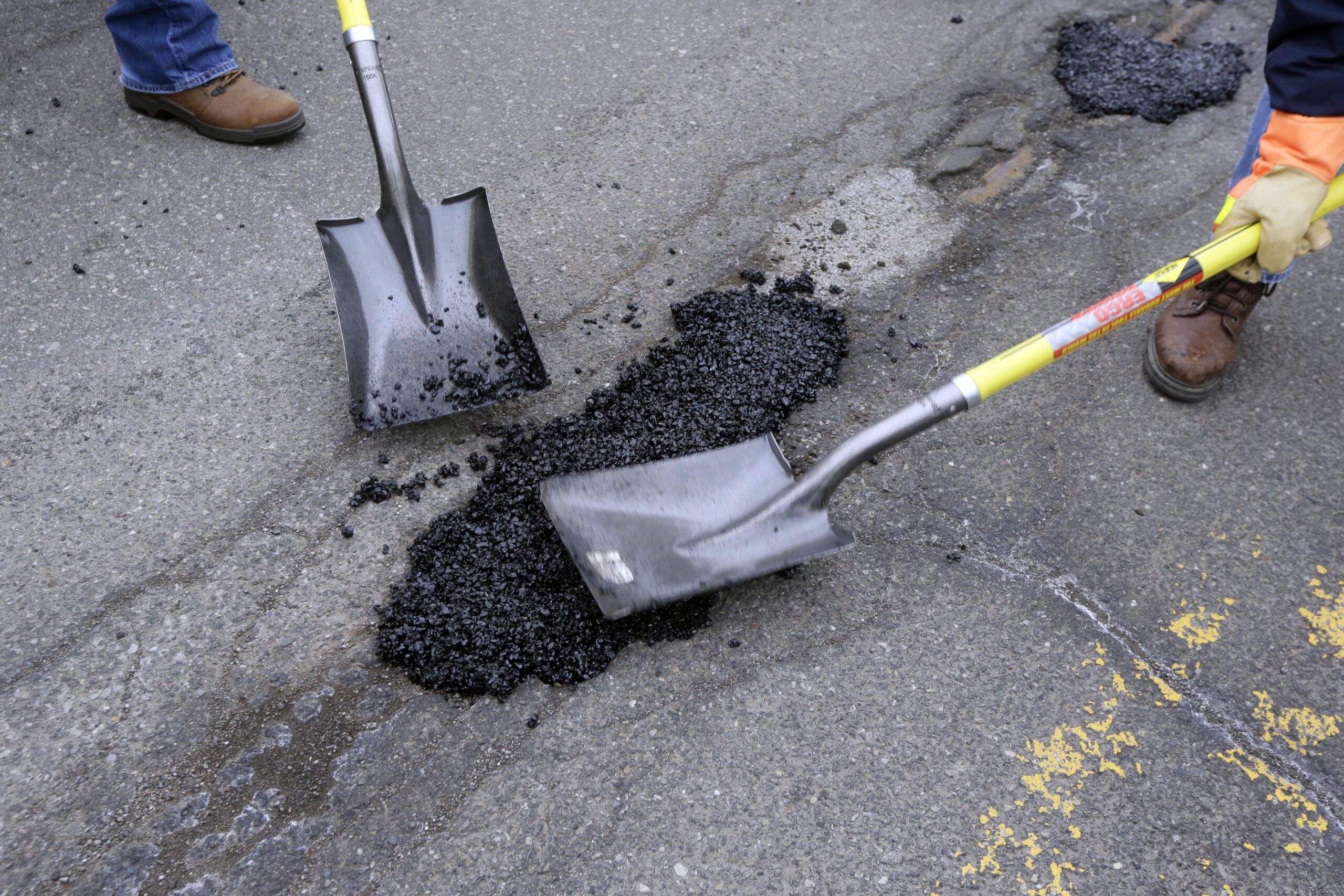 Road construction fills a pothole