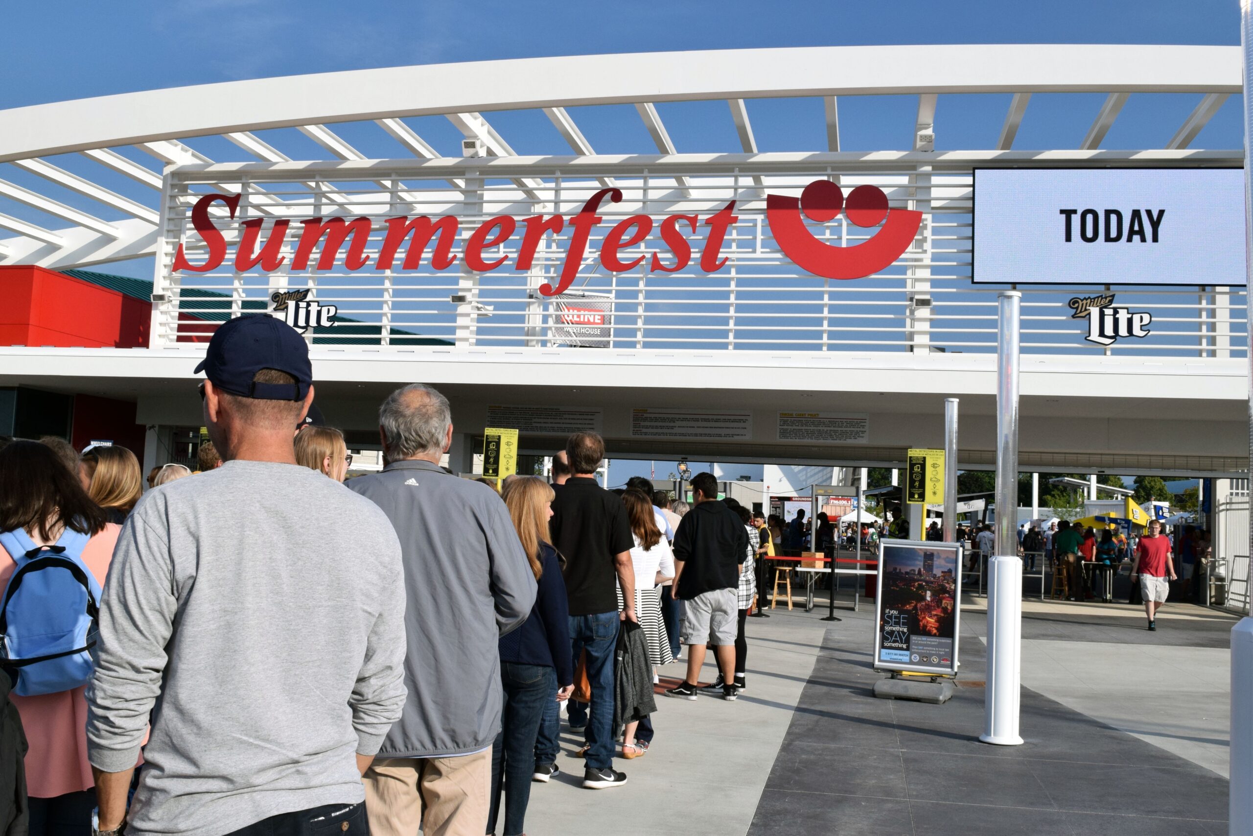 People wait in line to get into Summerfest