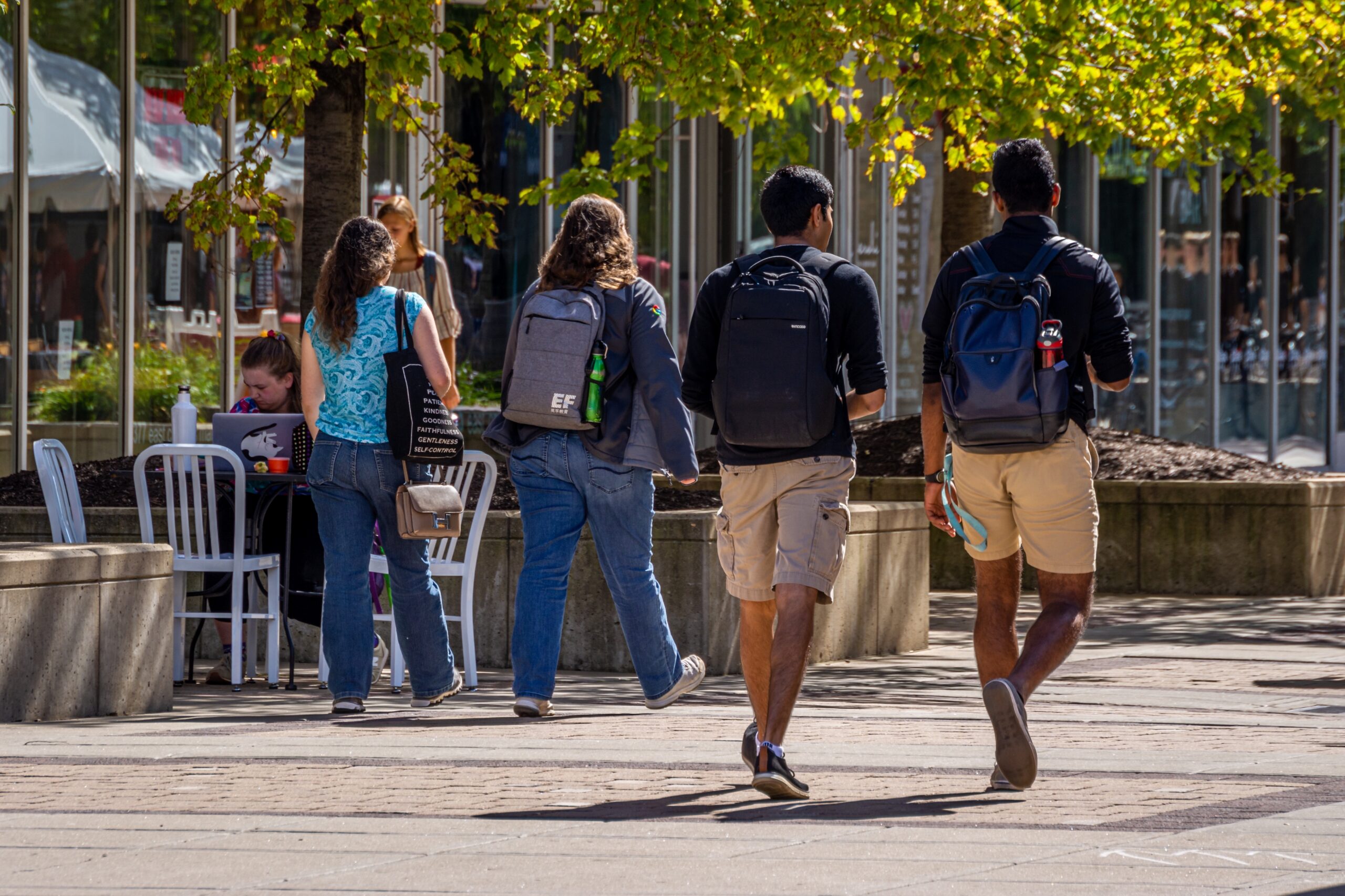 Students walking on East Campus Mall on the University of Wisconsin-Madison campus.