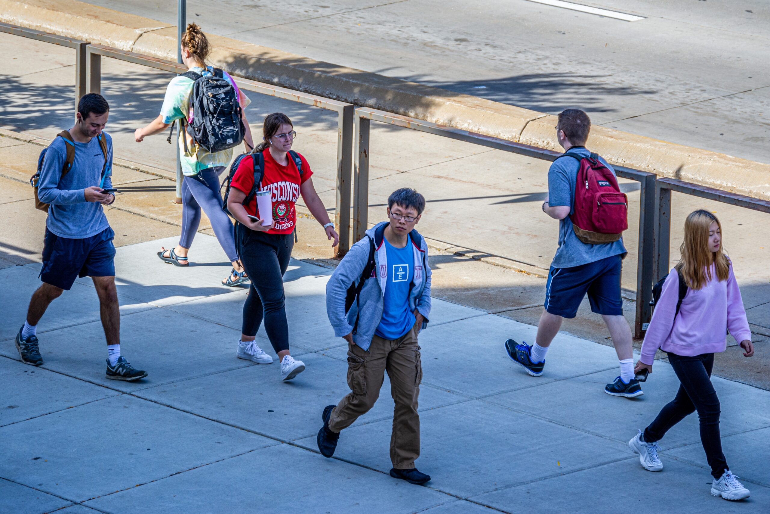 Students walking along University Ave. on the University of Wisconsin-Madison campus.