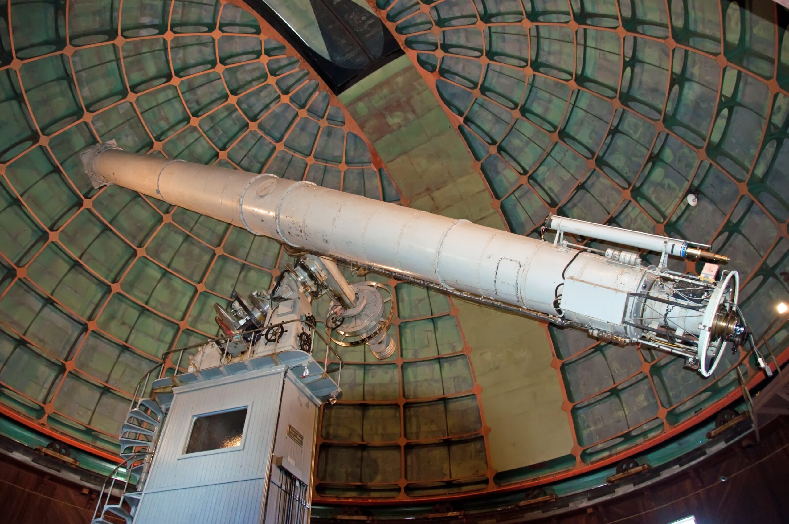 The Yerkes Observatory telescope lens is 40 inches in diameter, the largest refracting telescope ever built.
