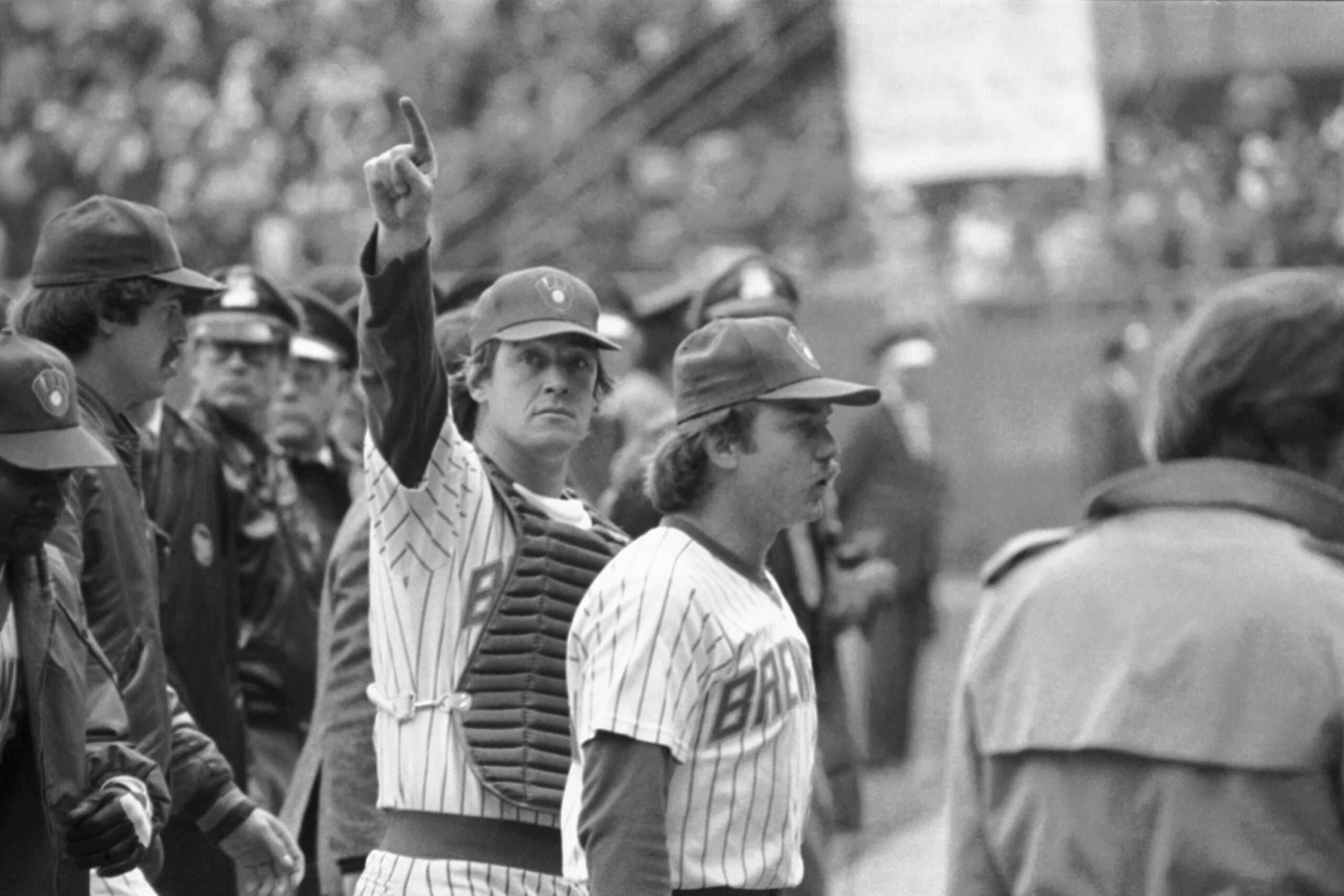 Ted Simmons of the Milwaukee Brewers points to the crowd after winning an 1982 World Series game