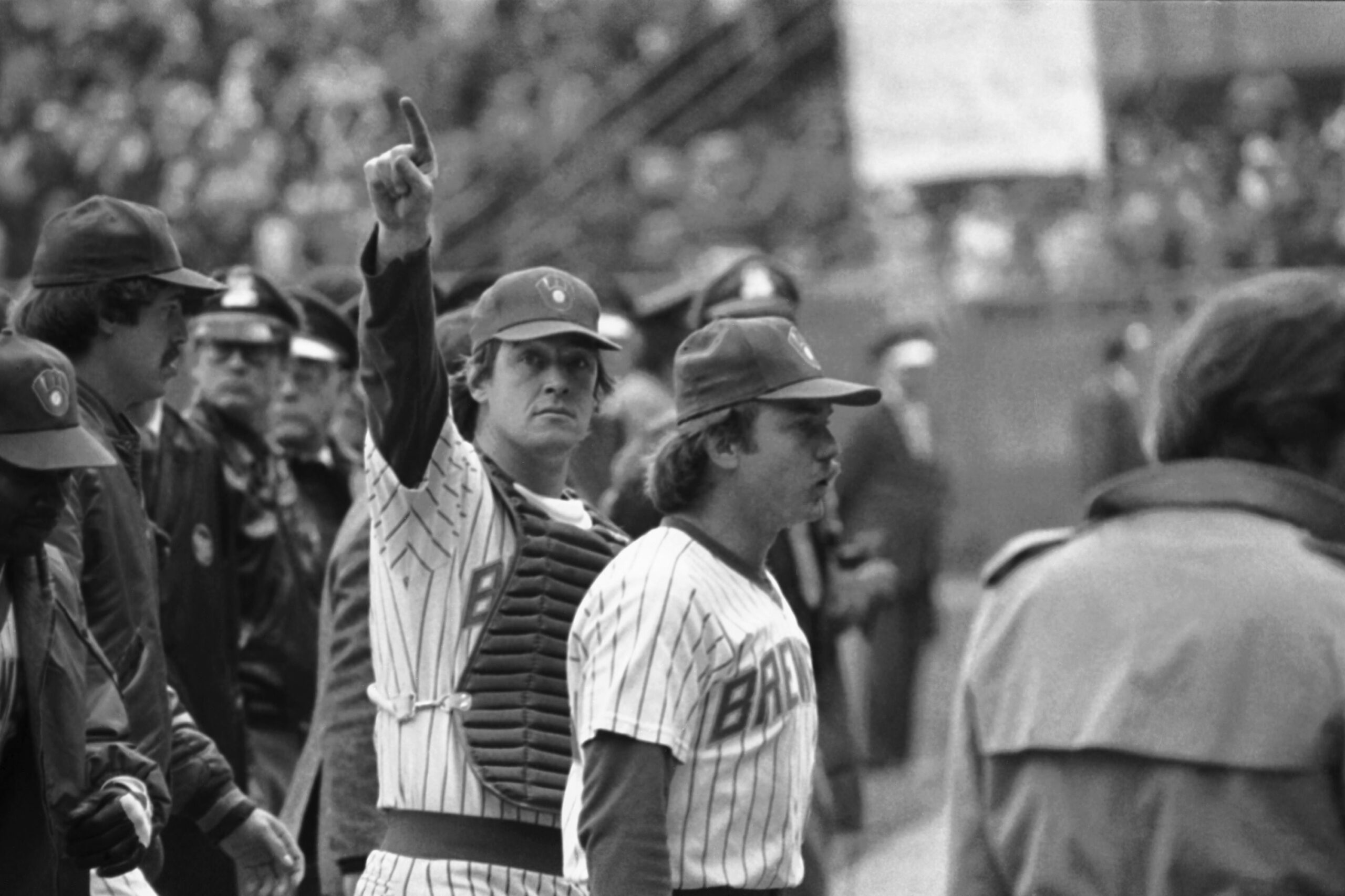Ted Simmons of the Milwaukee Brewers points to the crowd after winning an 1982 World Series game