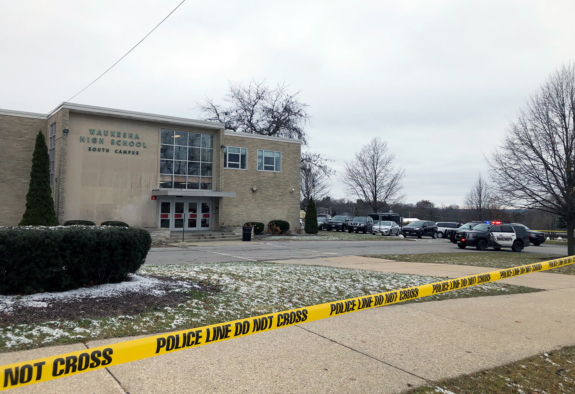 Police tape is posted outside Waukesha South High School