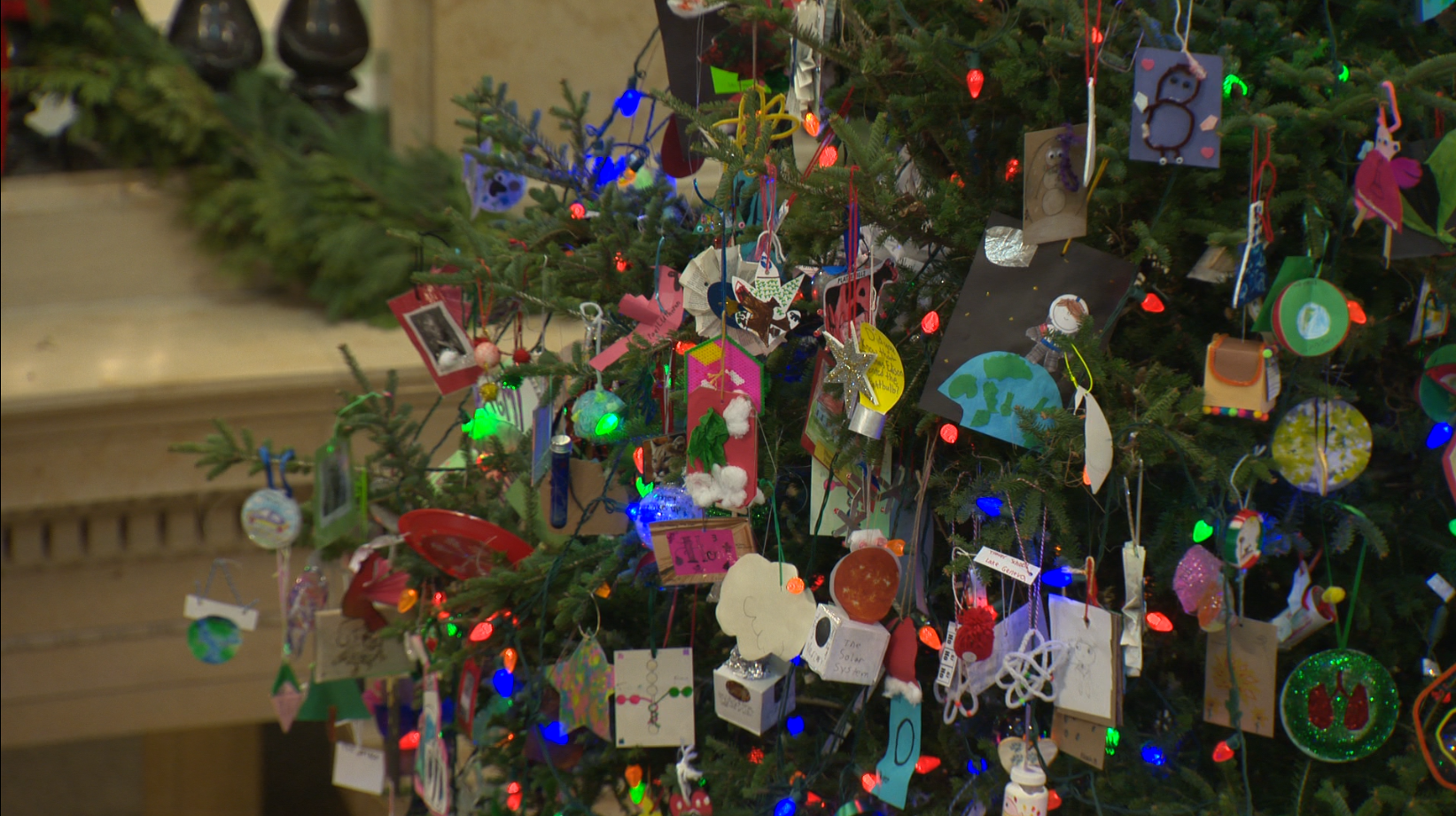 Science-themed ornaments decorate the tree in the Wisconsin Capitol