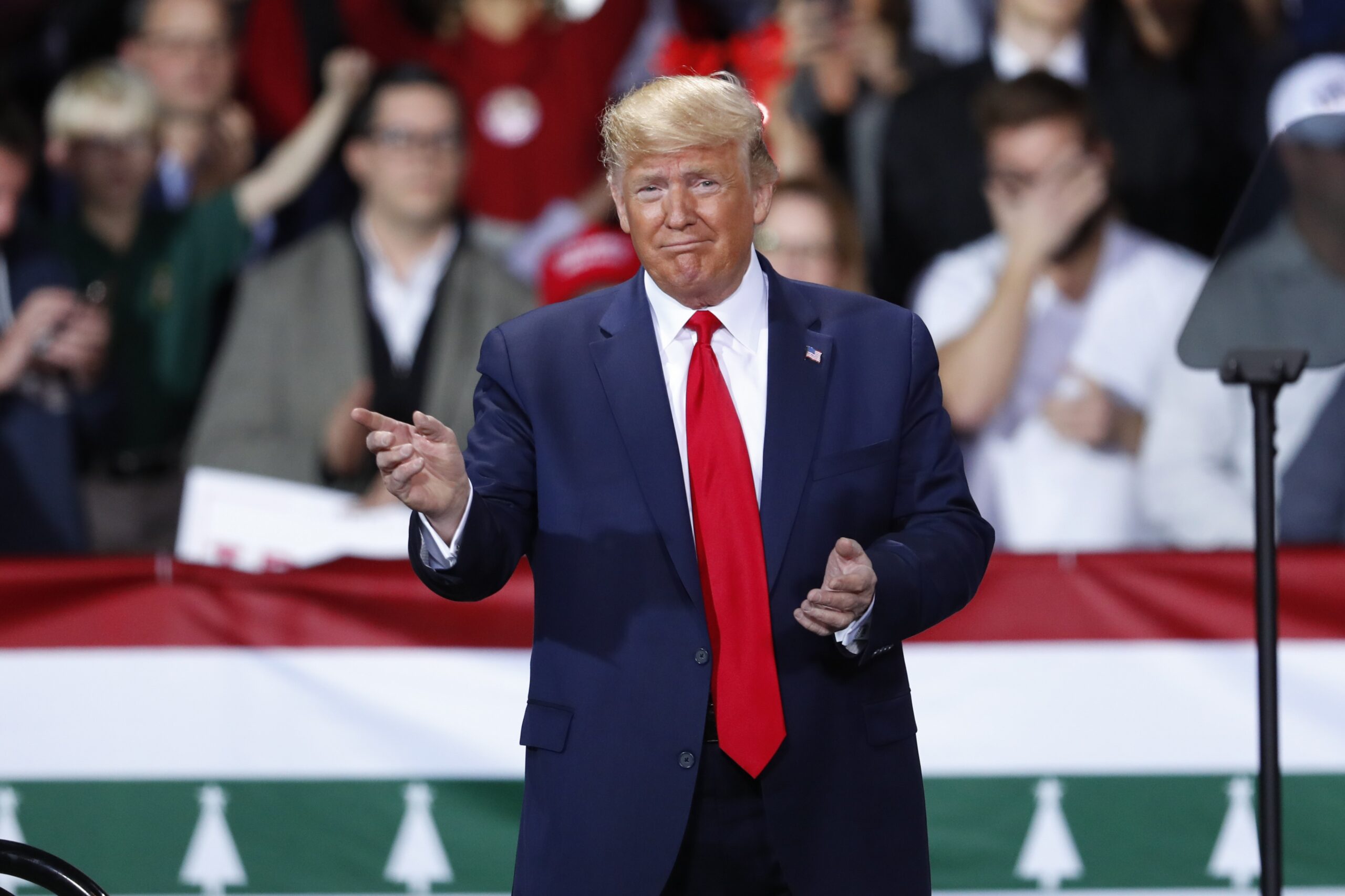 President Donald Trump arrives at a campaign rally in Battle Creek, Mich.