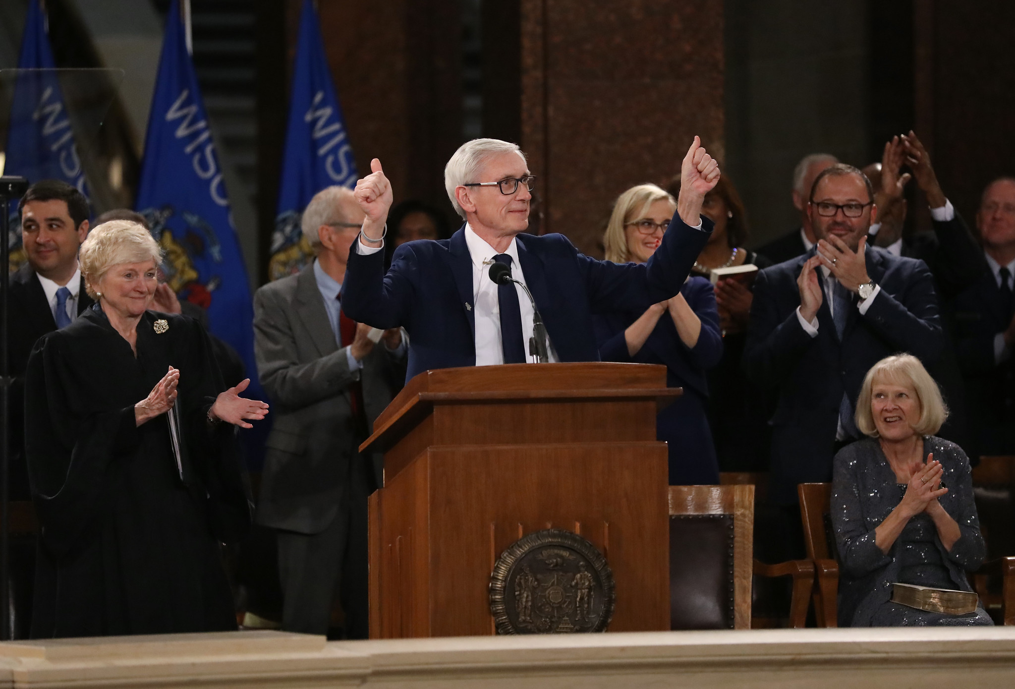 Tony Evers gives two thumbs up after being sworn in as Wisconsin’s 46th governor during a ceremony at the Wisconsin State Capitol on Jan 7, 2019.