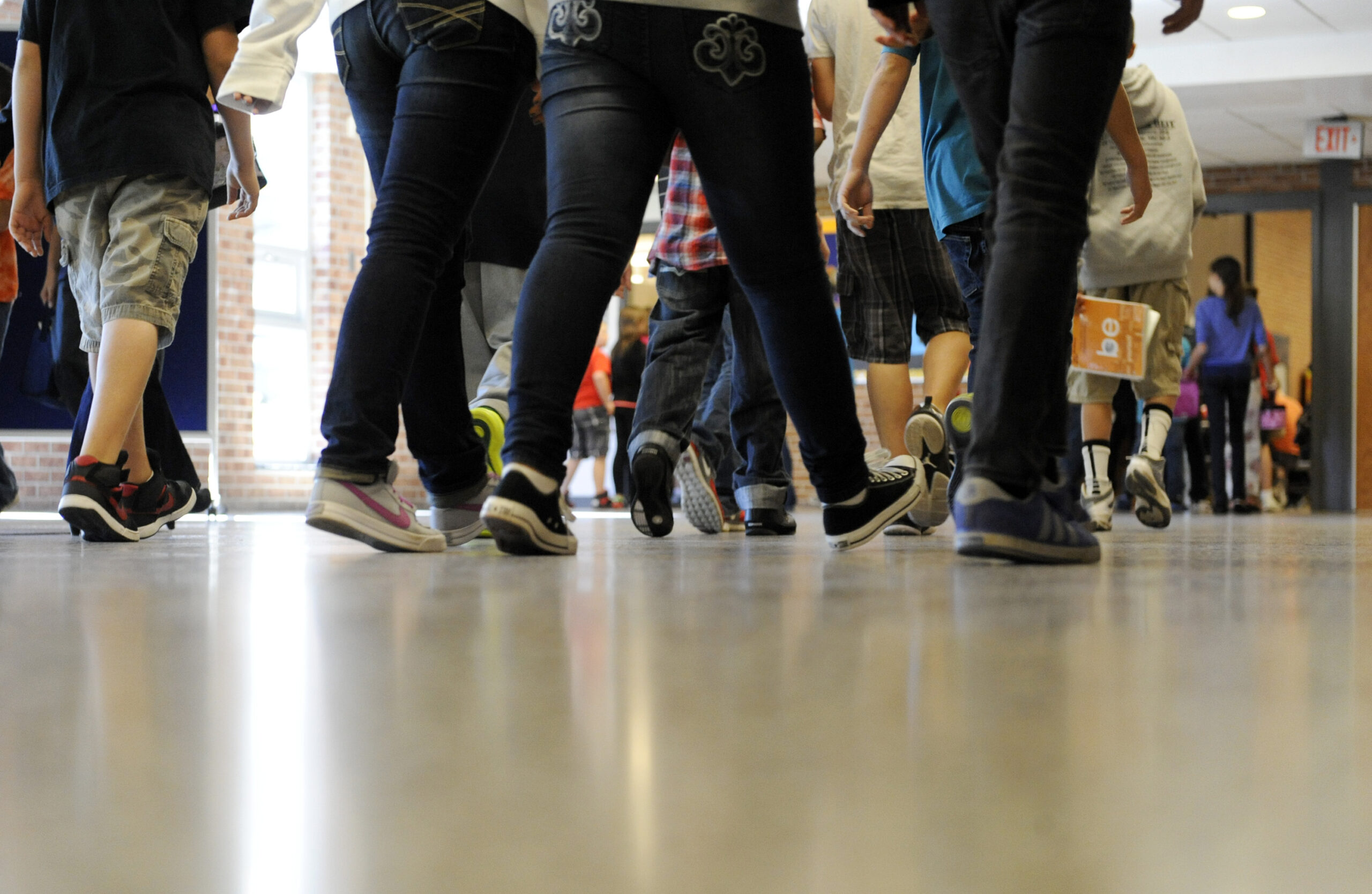 Students walk in the hallways at school