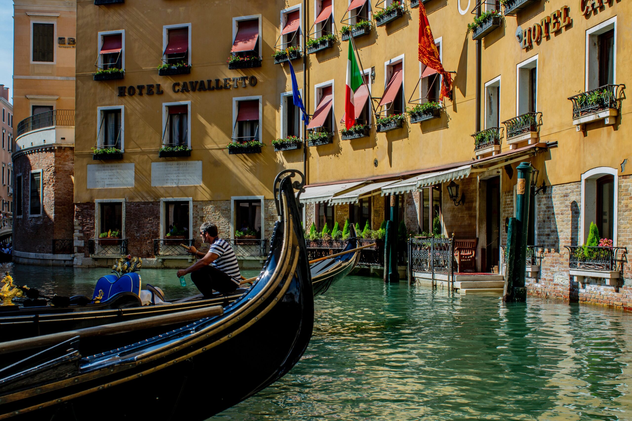 Gondolier aboard a gondola in Venice, Italy