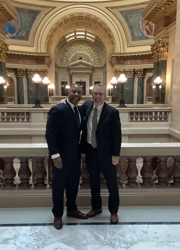 Jarrett Adams, left, and Keith Findley pose for a photo together