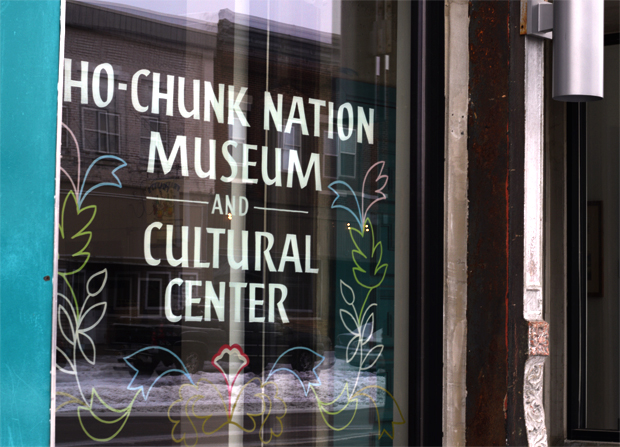 A decal invites patrons into the Ho-Chunk Nation Museum and Cultural Center