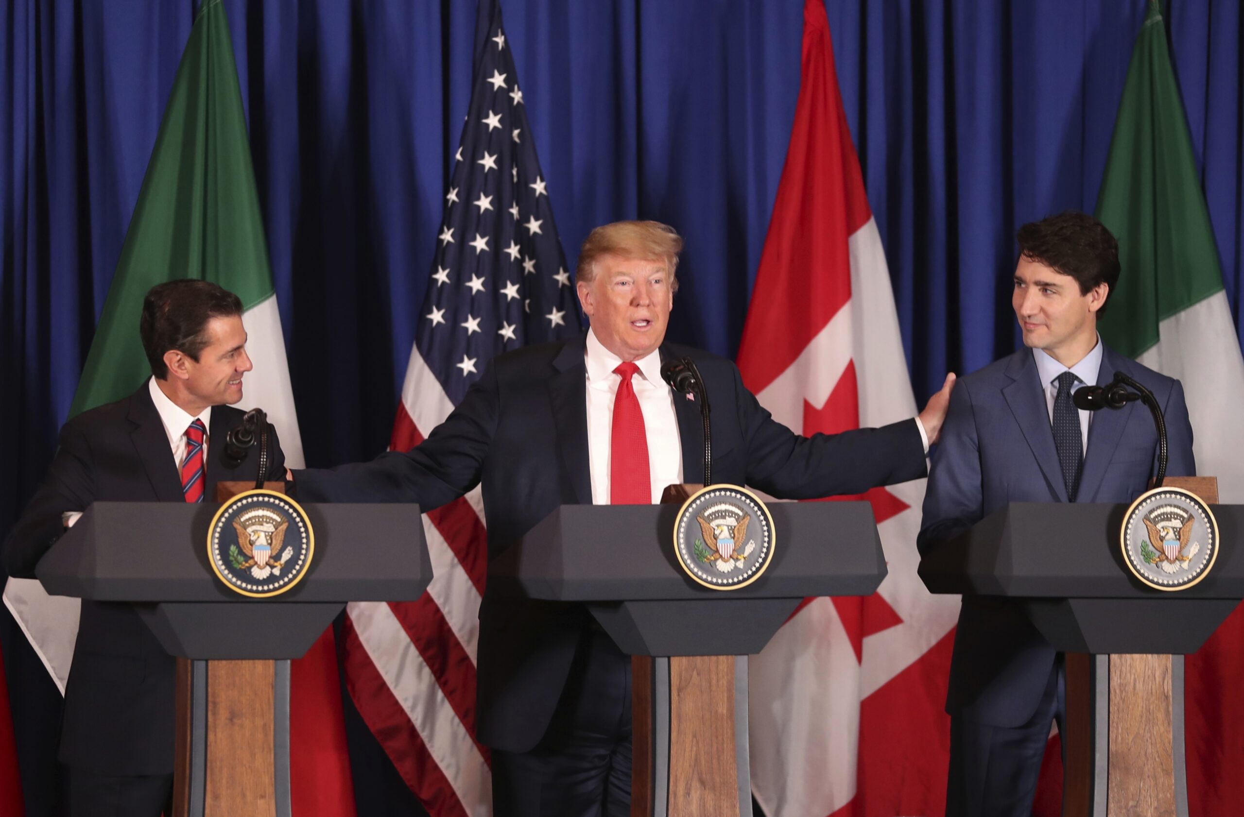 President Donald Trump, Mexico's President Enrique Pena Nieto, and Canada's Prime Minister Justin Trudeau