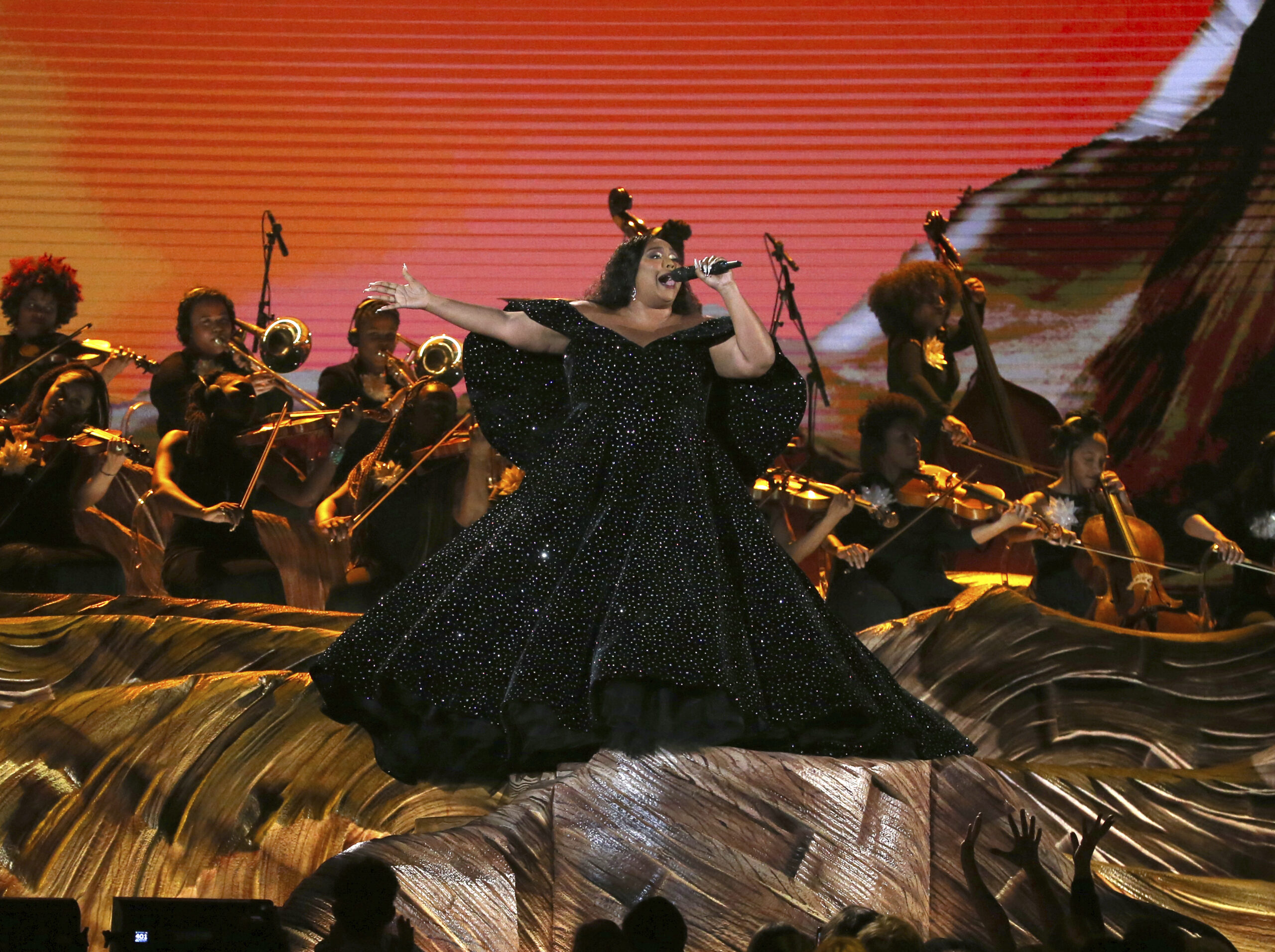 Lizzo performs at the Grammy Awards