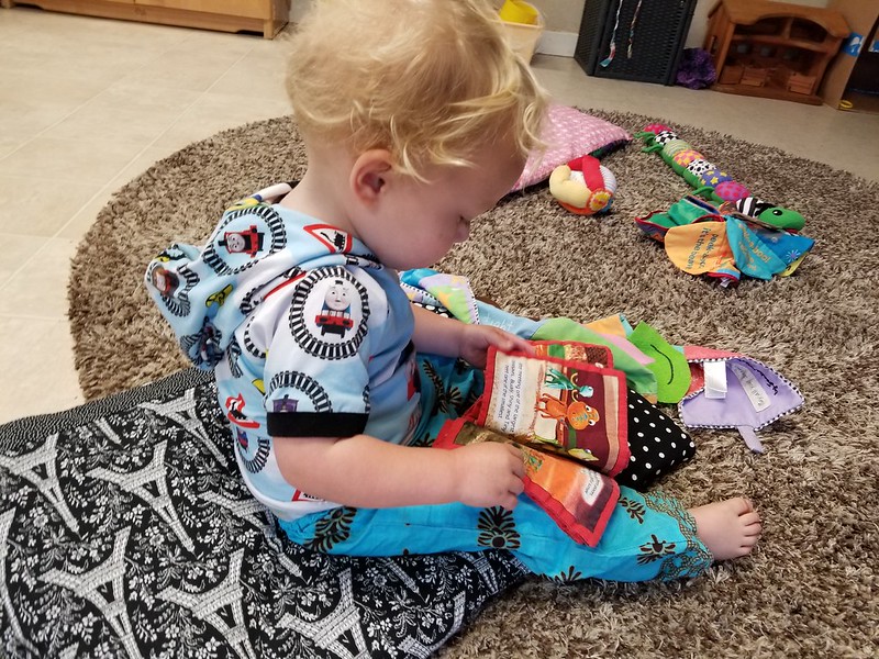 Toddler reading at home