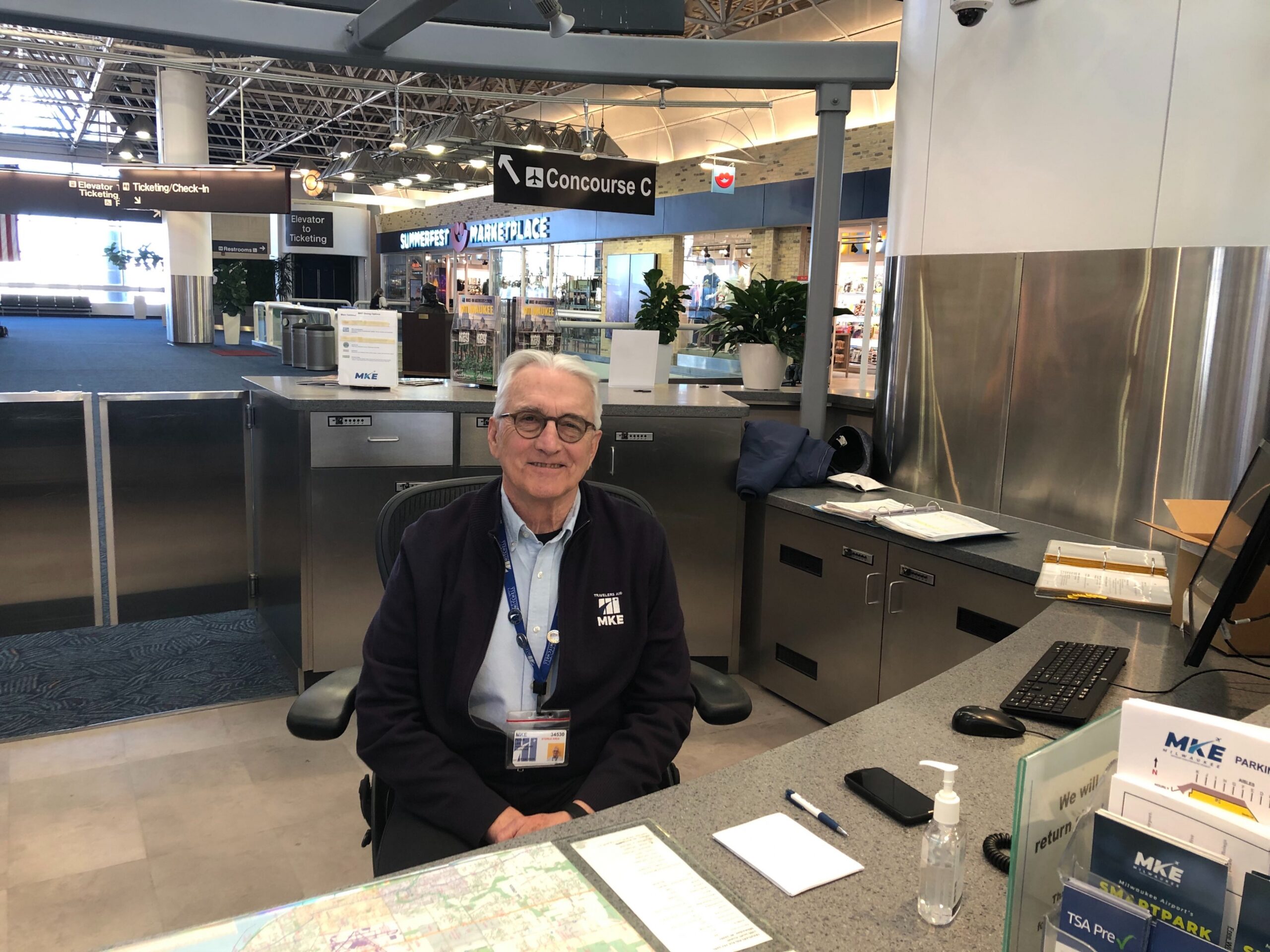 Peter Lee works at the Mitchell International Airport information desk