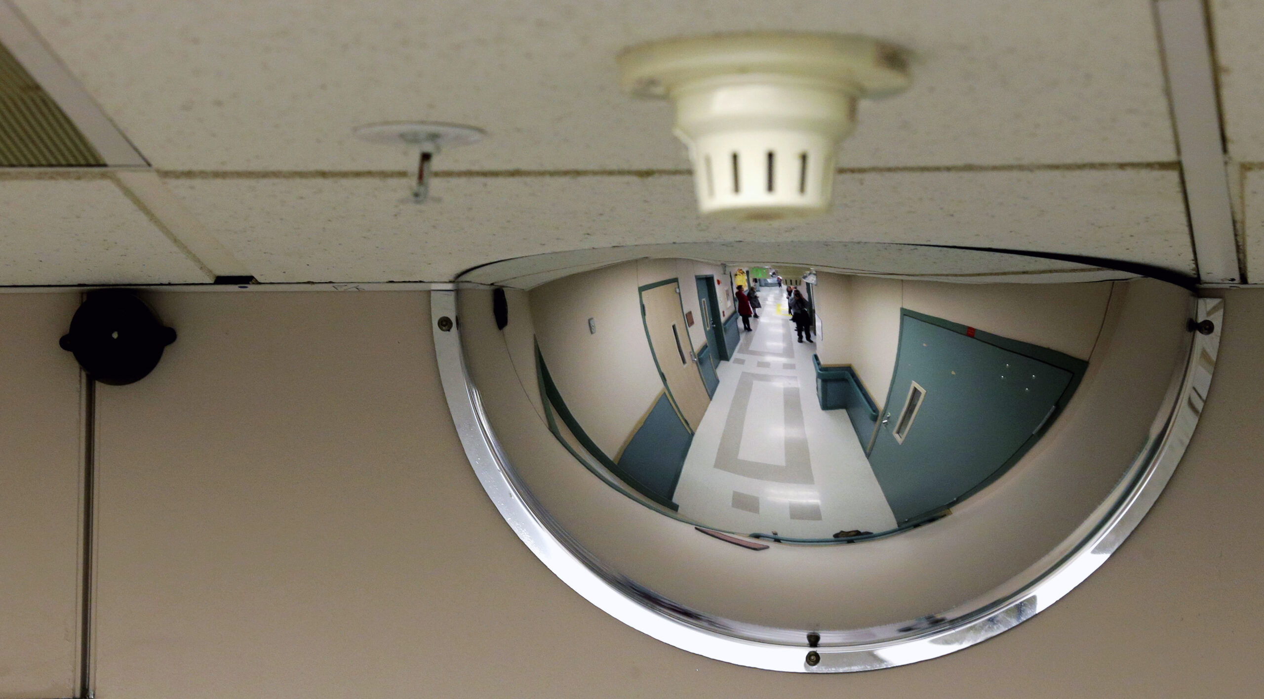 Camera on the ceiling in a hospital hallway