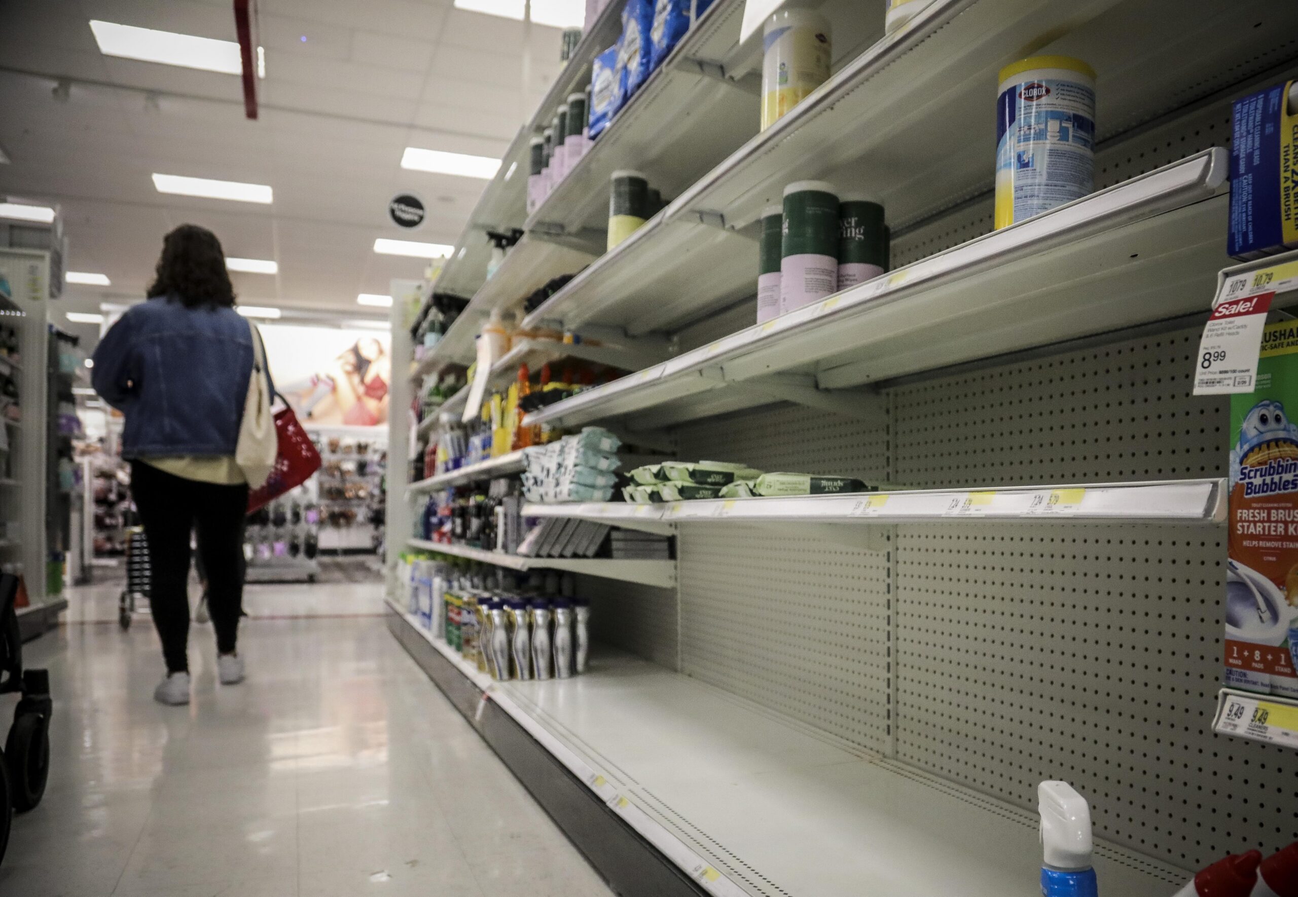 Empty shelves for disinfectant wipes wait for restocking, as concerns grow around COVID-19