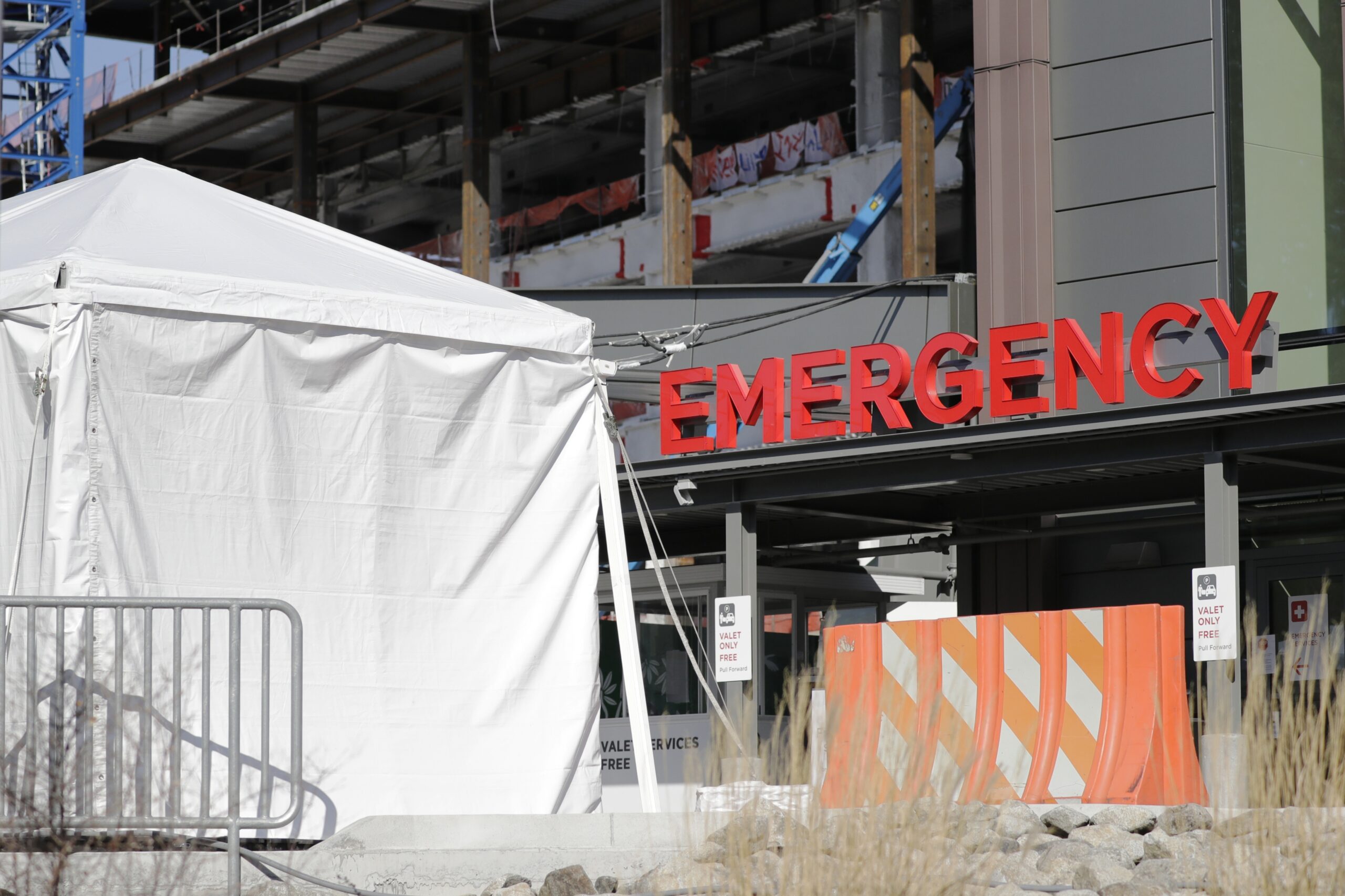A tent stands at the emergency entrance to Seattle Children's hospital