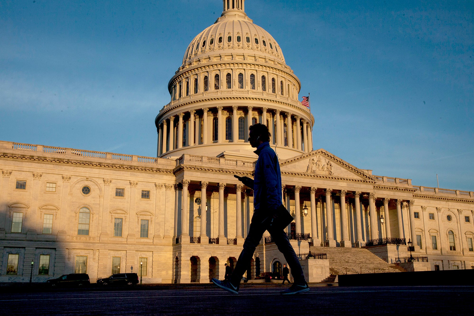 Man walks past the capitol
