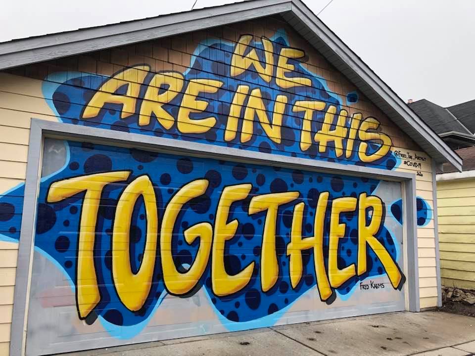 A homemade sign of encouragement on a garage in a Milwaukee neighborhood.