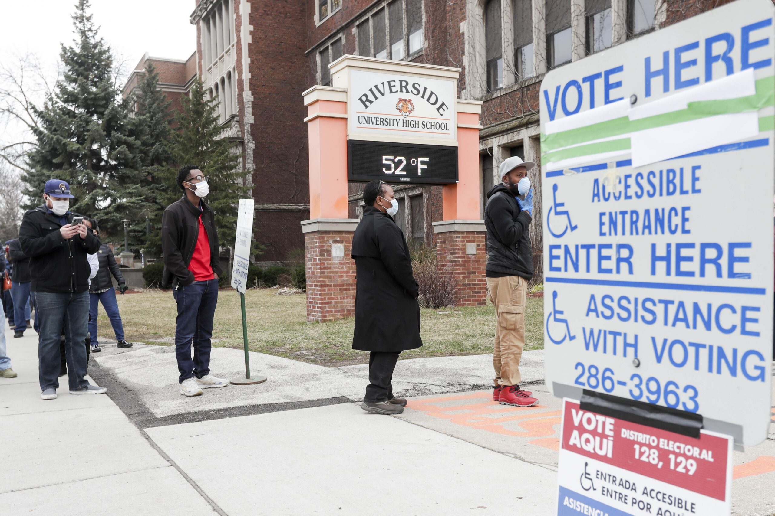 Voters line up at Riverside High School for Wisconsin's primary election