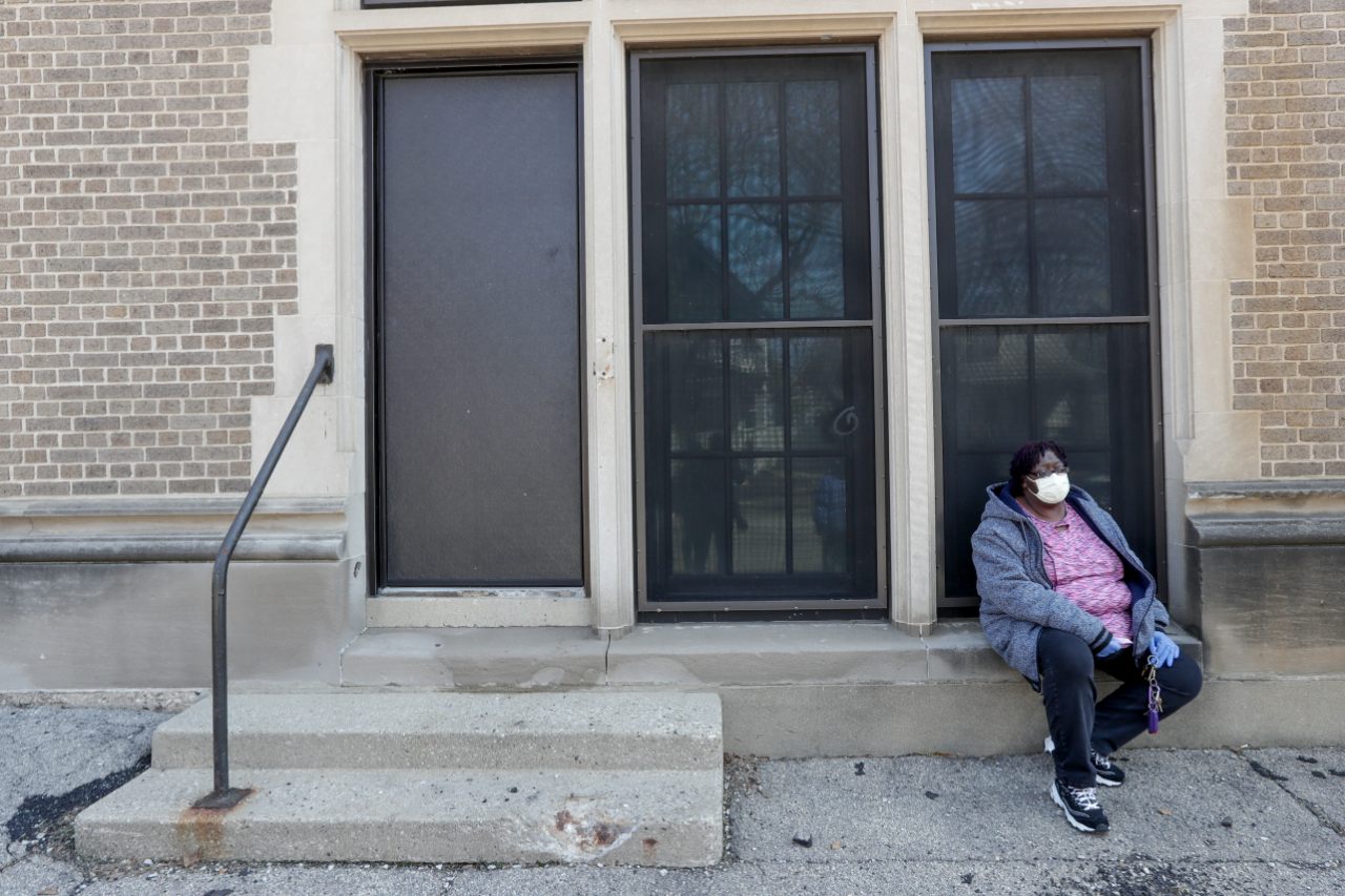 Woman waits to cast her ballot in spring election.